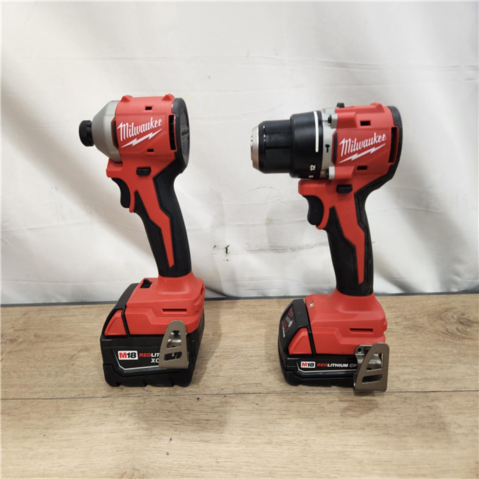 AS-IS- M18 18-Volt Lithium-Ion Brushless Cordless Compact Hammer Drill/Impact Combo Kit (2-Tool) with (2) Batteries  Bag