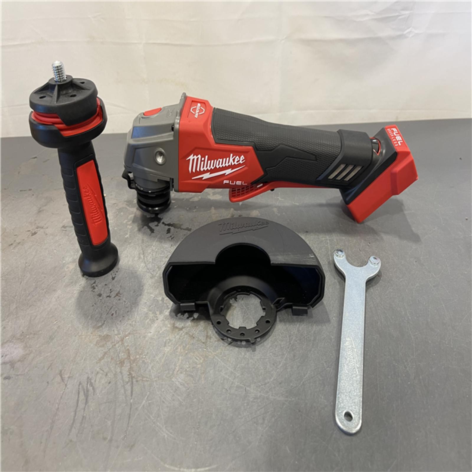 AS-IS - Milwaukee M18 FUEL 18V Lithium-Ion Brushless Cordless 4-1/2 in./5 in. Grinder with Variable Speed & Paddle Switch