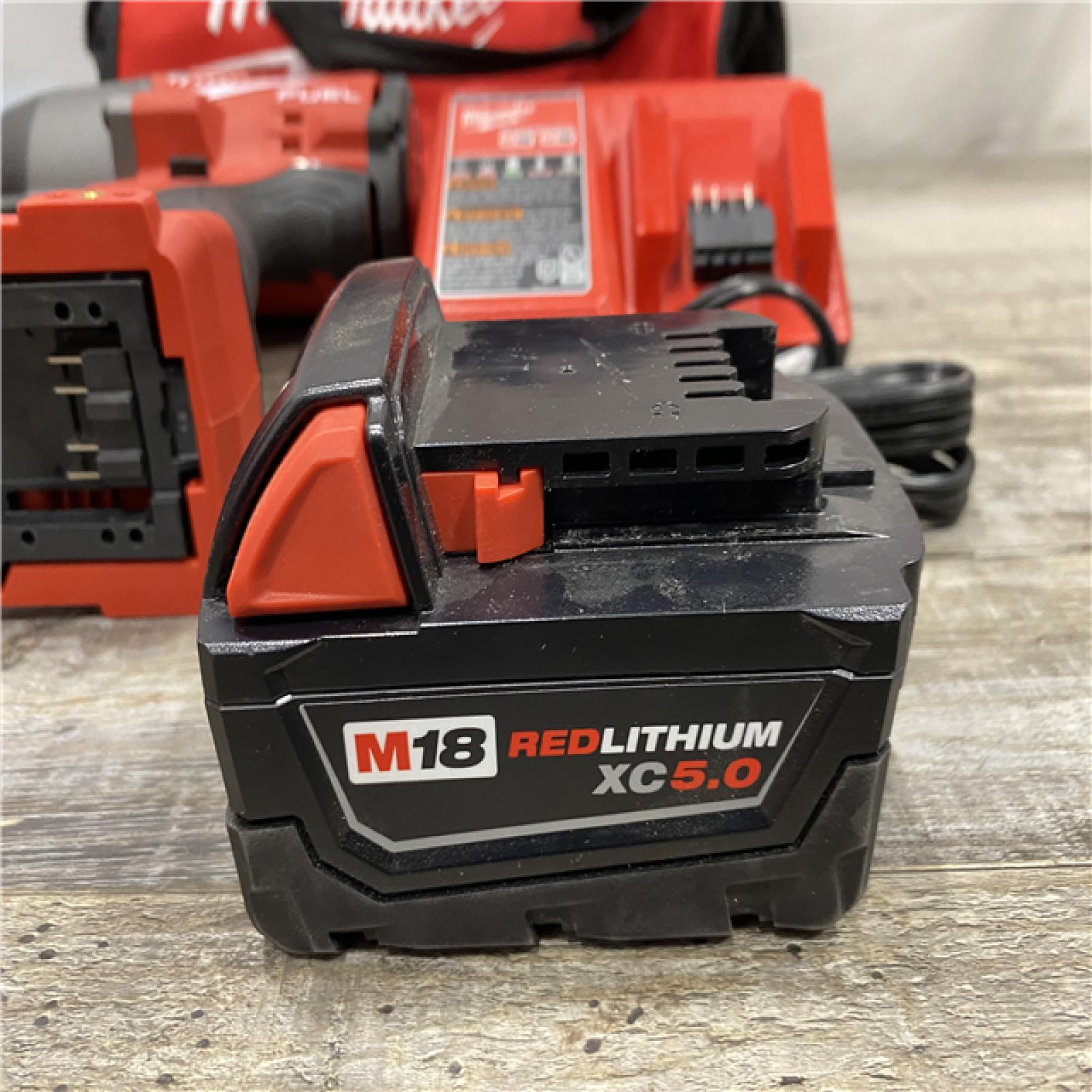 AS-IS Milwaukee FUEL 18V Lithium-Ion Brushless Cordless 1/2 in. Impact Wrench w/Friction Ring Kit