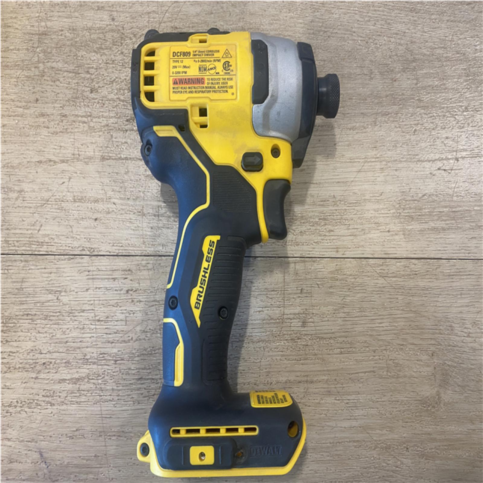 AS-IS DEWALT ATOMIC 20V MAX Cordless Brushless Compact 1/4 in. Impact Driver (Tool Only)