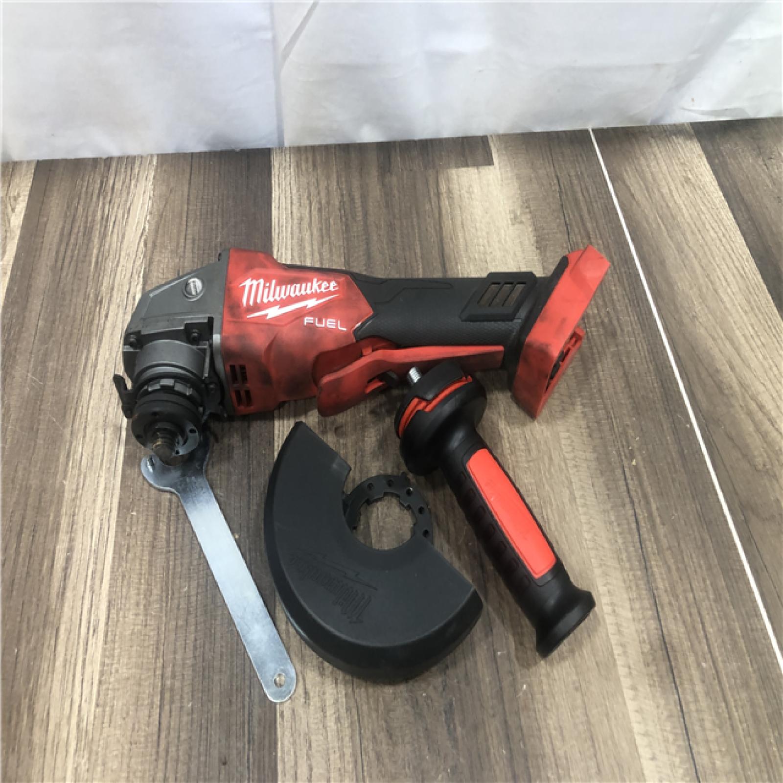 AS-IS Milwaukee FUEL 18V Lithium-Ion Brushless Cordless 4-1/2 in./5 in. Grinder with Variable Speed & Paddle Switch (Tool-Only)