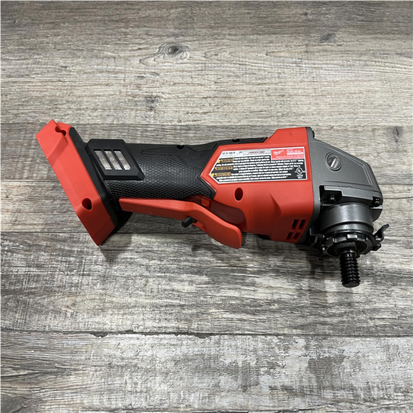 AS-IS Milwaukee FUEL 18V Lithium-Ion Brushless Cordless 4-1/2 in./5 in. Grinder w/Paddle Switch (Tool-Only)