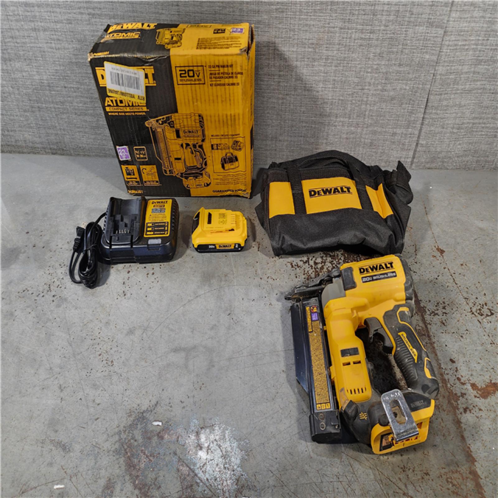 HOUSTON LOCATION - AS-IS DEWALT ATOMIC 20V MAX Lithium Ion Cordless 23 Gauge Pin Nailer Kit with 2.0Ah Battery and Charger