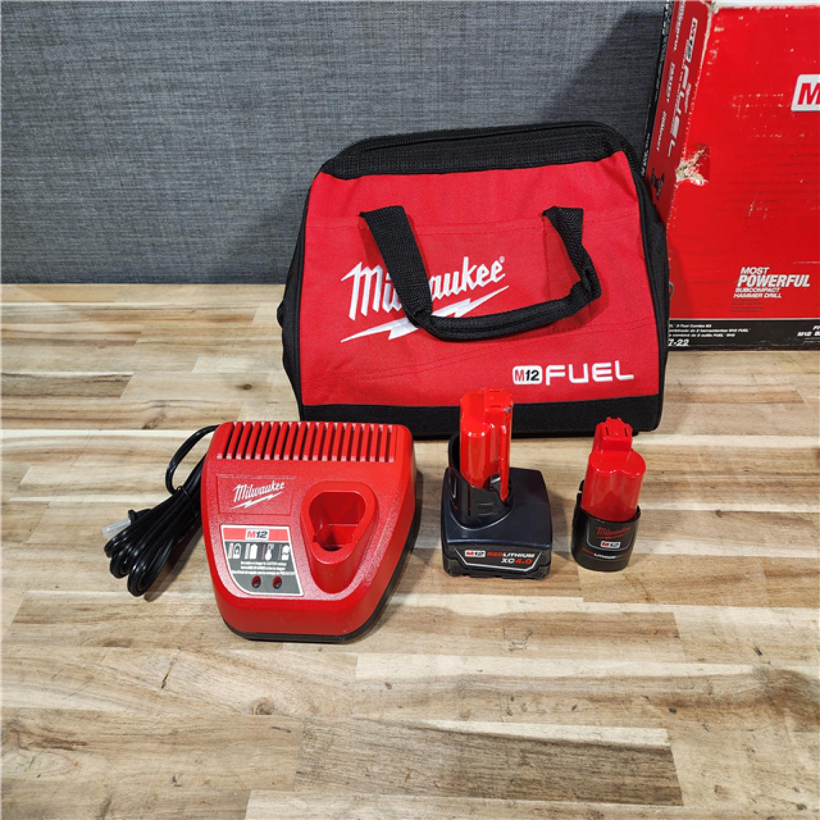 HOUSTON LOCATION - AS-IS Milwaukee FUEL 12-Volt Lithium-Ion Brushless Cordless Hammer Drill and Impact Driver Combo Kit