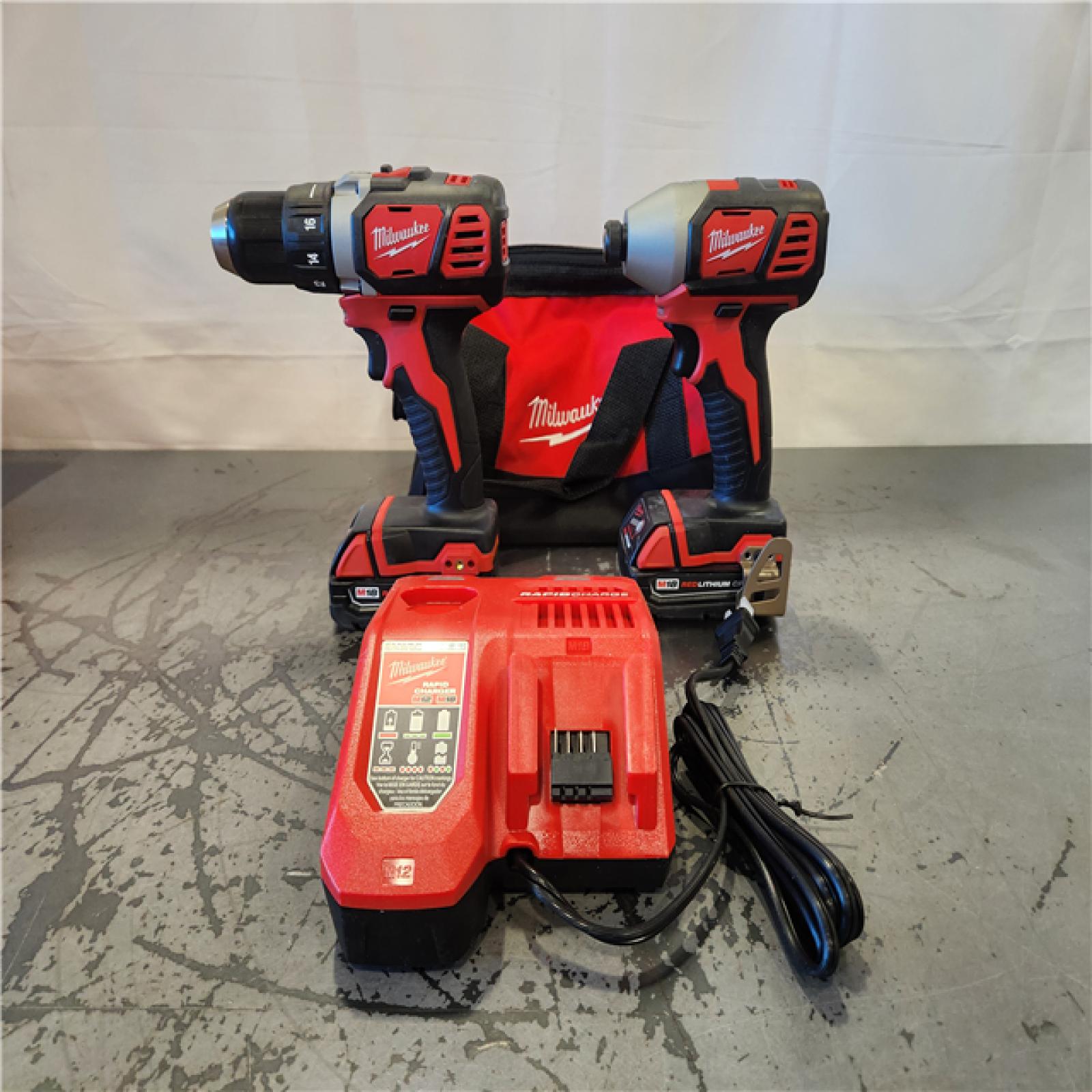 AS-IS- Milwaukee 18V Lithium-Ion Cordless Drill Driver/Impact Driver Combo Kit