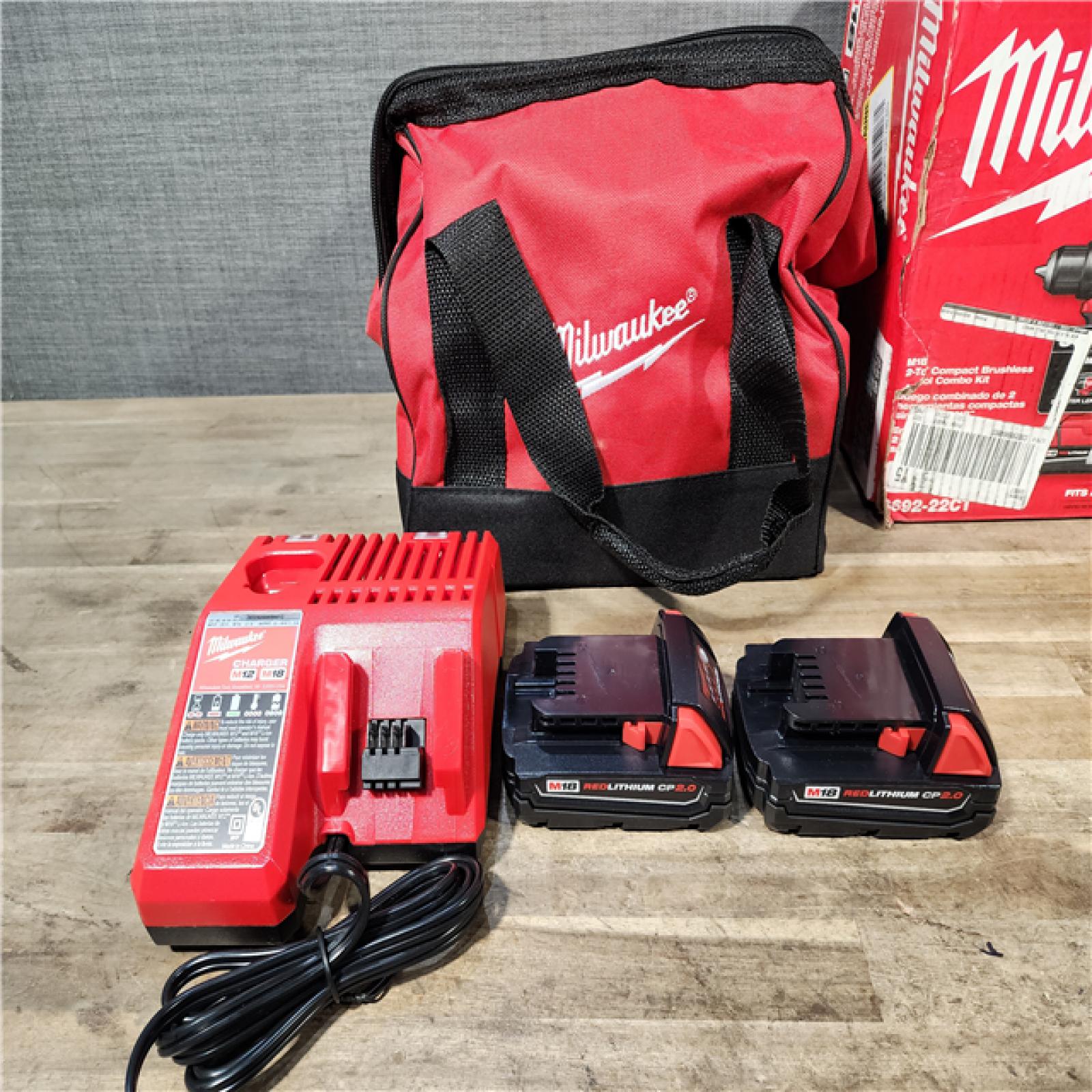 HOUSTON LOCATION - AS-IS Milwaukee M18 18V Lithium-Ion Brushless Cordless Compact Drill/Impact Combo Kit (2-Tool) W/(2) 2.0 Ah Batteries  Charger & Bag