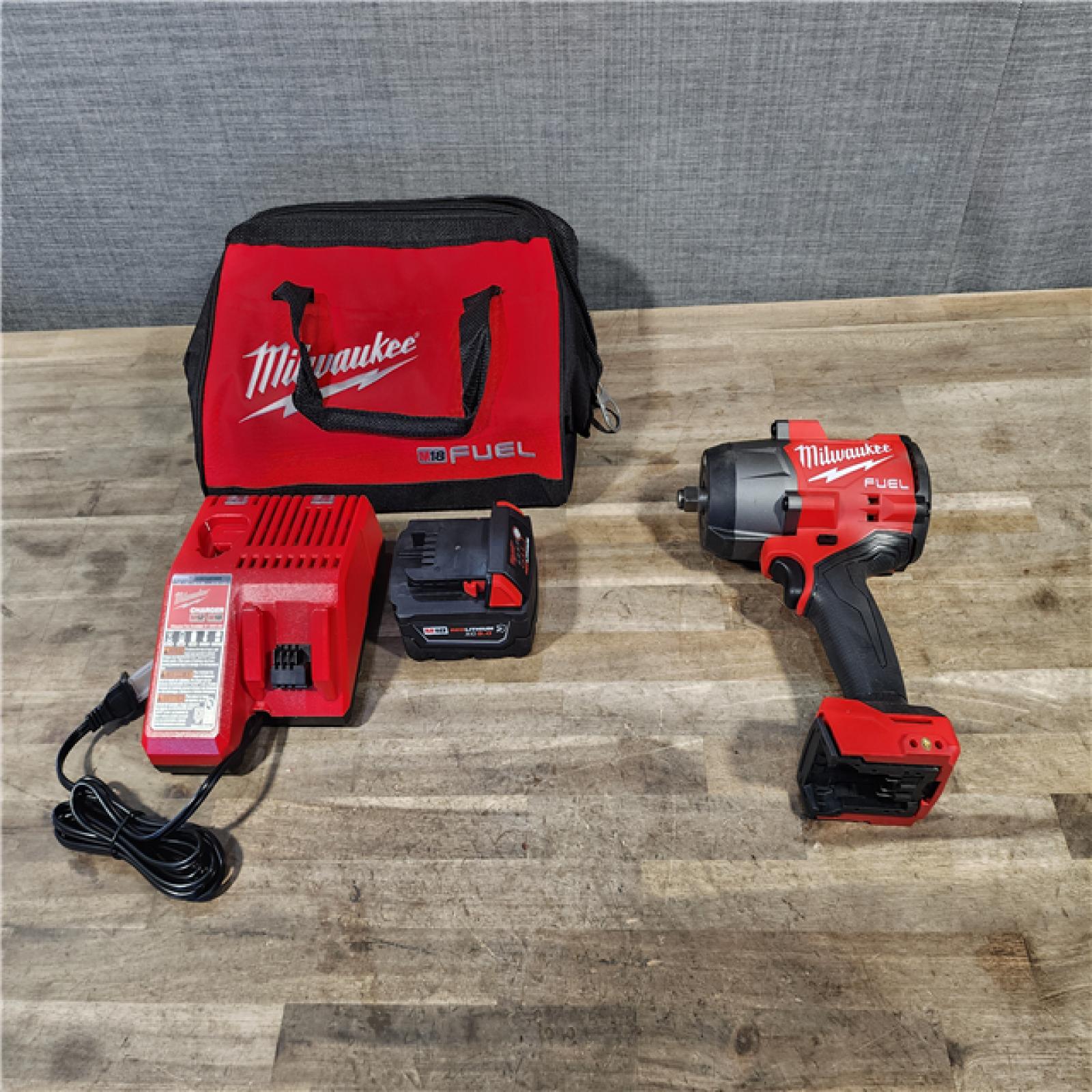 HOUSTON LOCATION - AS-IS Milwaukee M18 1/2 in. Cordless Brushless High Torque Impact Wrench Kit (Battery & Charger)