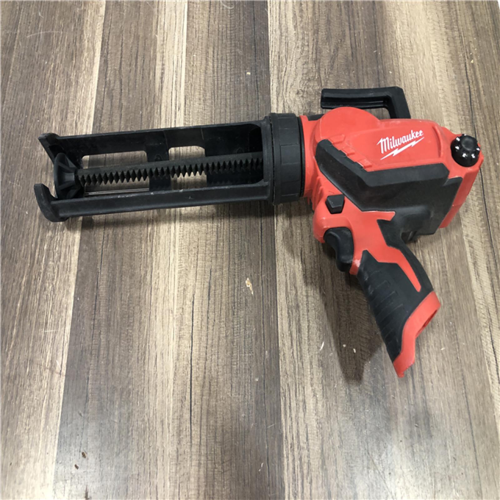 AS-IS Milwaukee 12V Lithium-Ion Cordless 10 oz. Adhesive and Caulk Gun (Tool-Only)