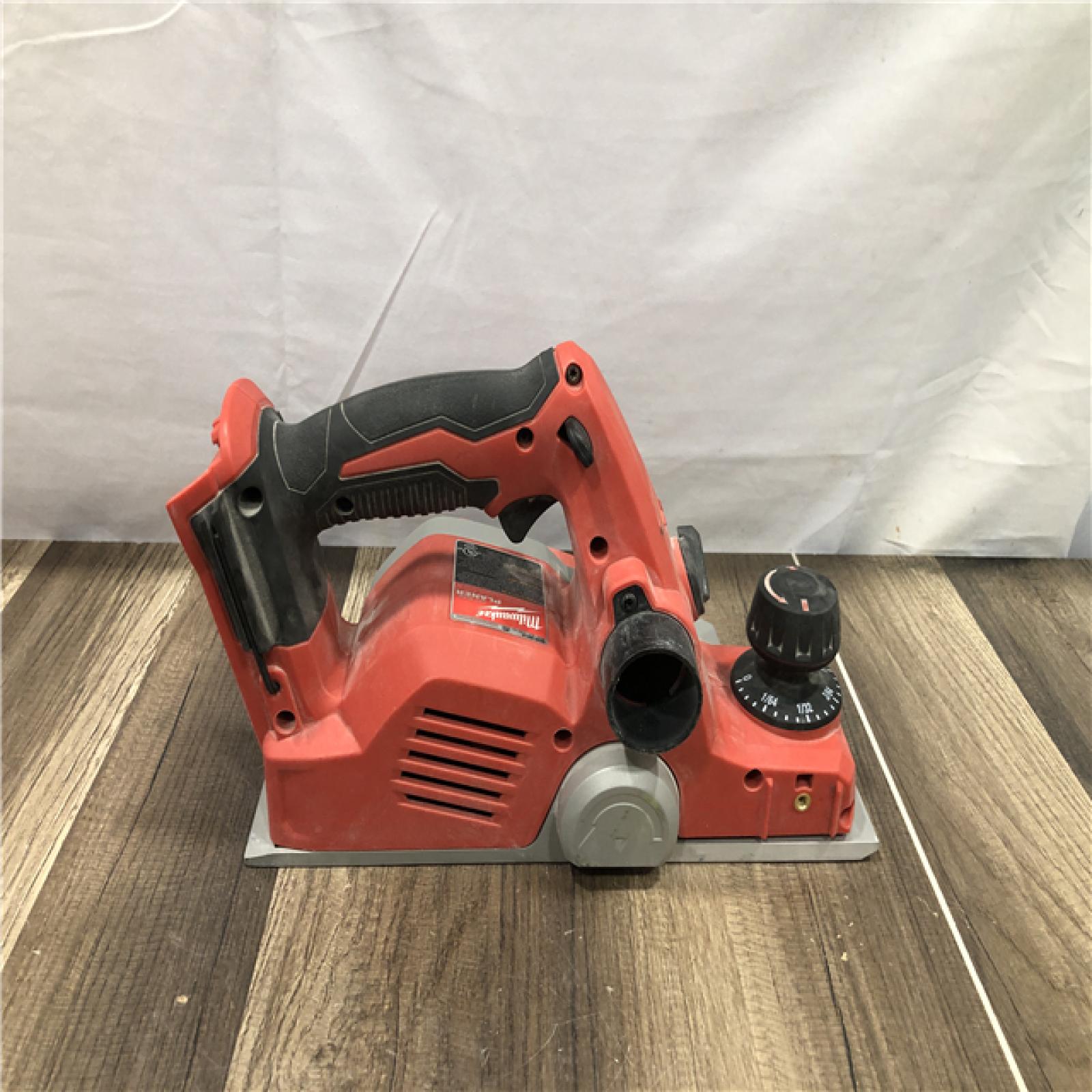 AS-IS Milwaukee M18 18V Lithium-Ion Cordless 3-1/4 in. Planer (Tool-Only)