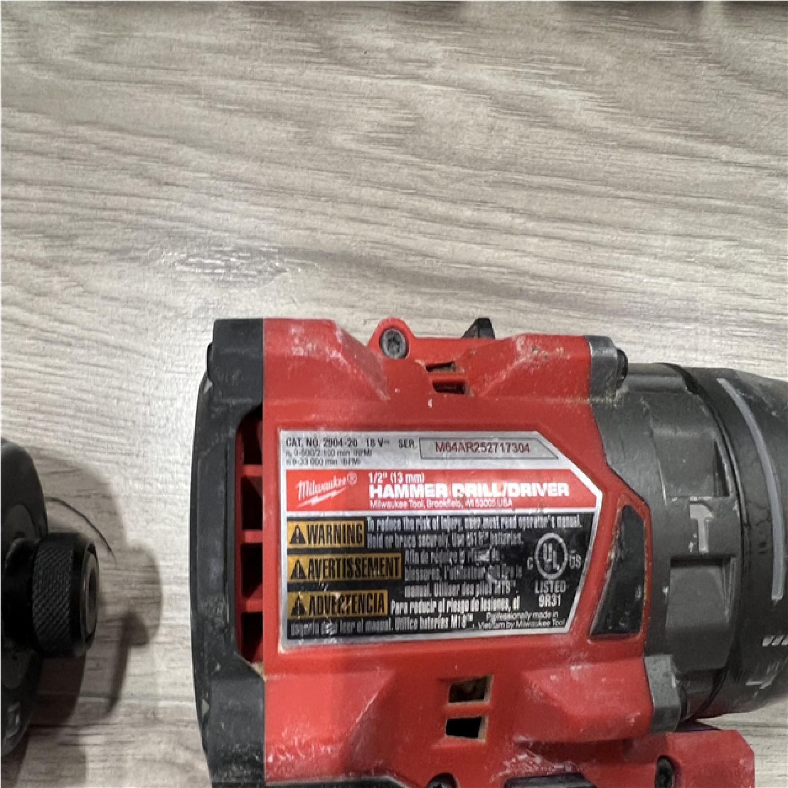 AS-IS Milwaukee FUEL 18V Lithium-Ion Brushless Cordless Hammer Drill and Impact Driver Combo Kit