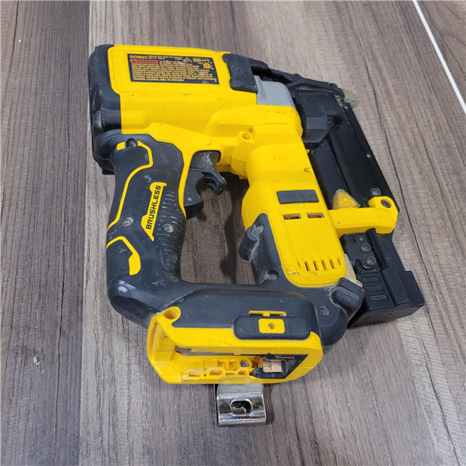 AS-IS DeWalt  20-Volt MAX Atomic Compact Cordless Pin Nailer Kit  Brushless Motor  23 Gauge  Battery