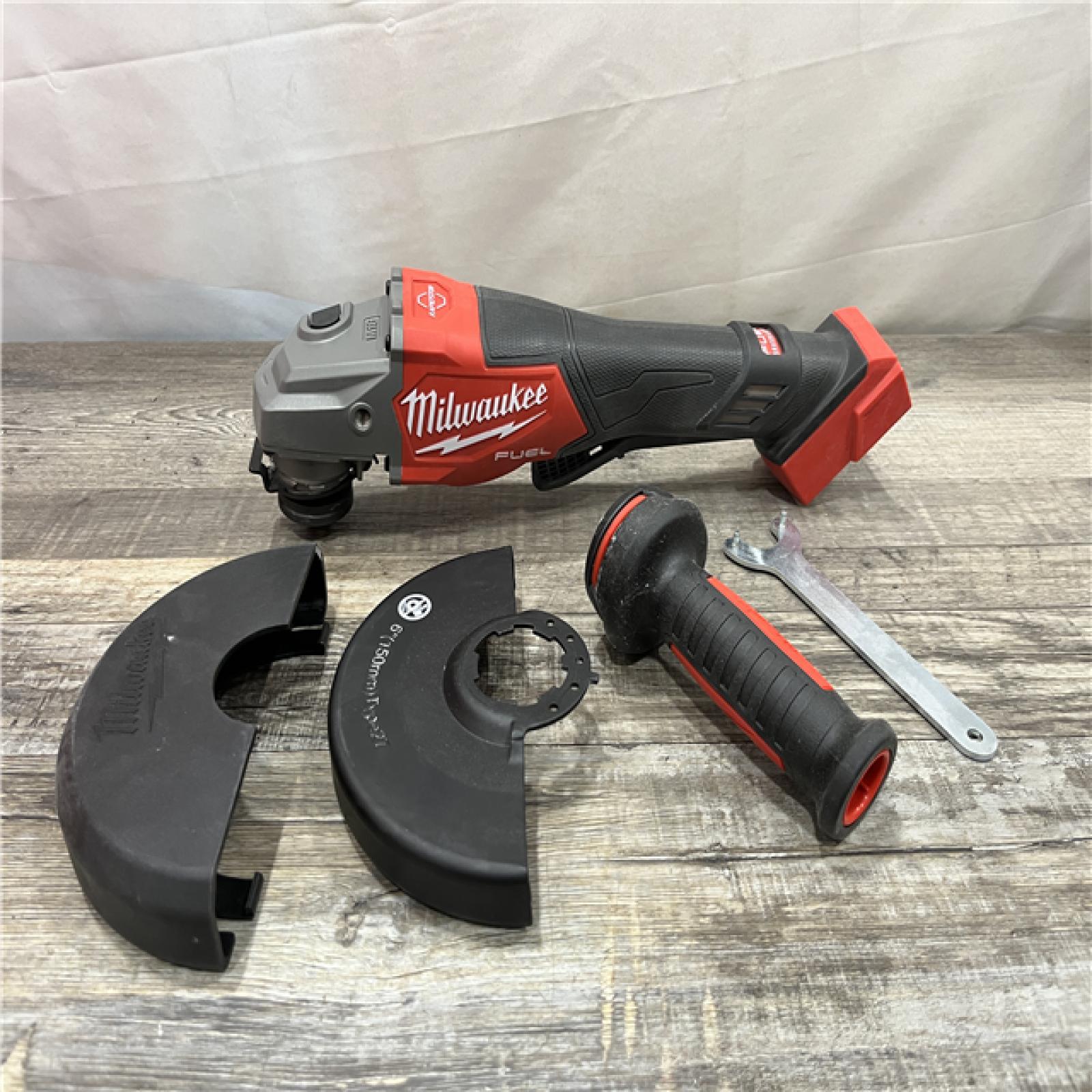 AS-IS Milwaukee FUEL 18-Volt Lithium-Ion Brushless Cordless 4-1/2 in./6 in. Braking Grinder with Paddle Switch (Tool-Only)