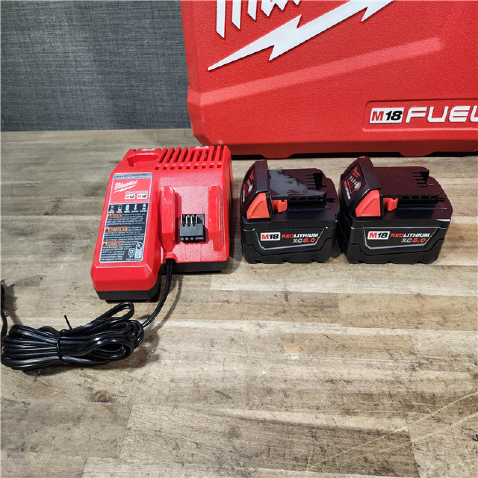 HOUSTON LOCATION - AS-IS (APPEARS LIKE NEW) Milwaukee FUEL 18V Lithium-Ion Brushless Cordless Hammer Drill and Impact Driver Combo Kit