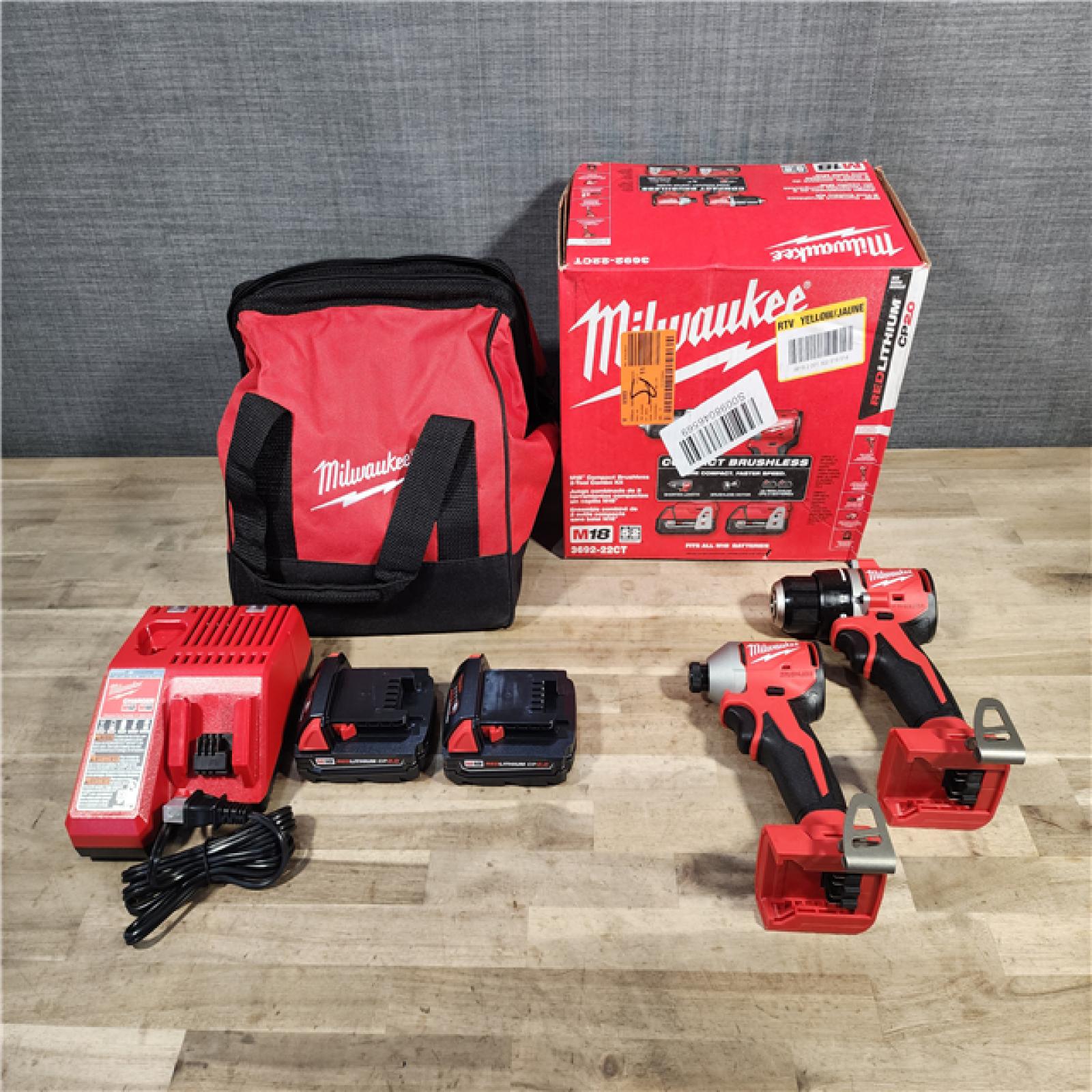 HOUSTON LOCATION - AS-IS (APPEARS LIKE NEW) Milwaukee M18 18V Lithium-Ion Brushless Cordless Compact Drill/Impact Combo Kit (2-Tool) W/(2) 2.0 Ah Batteries, Charger & Bag