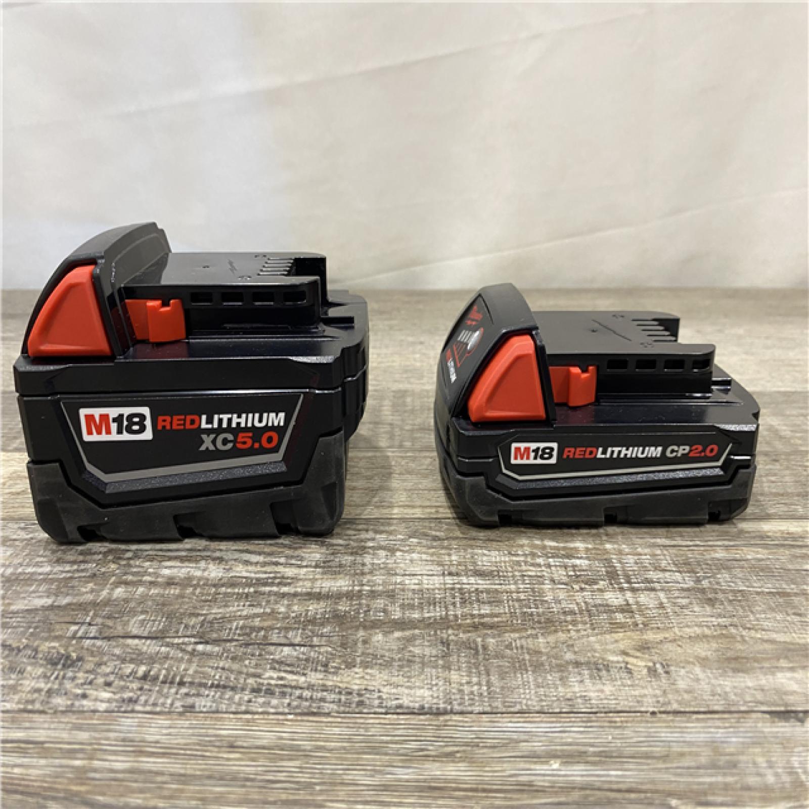 AS-IS Milwaukee 18-Volt Lithium-Ion Starter Kit with One 5.0 Ah and One 2.0 Ah Battery and Charger