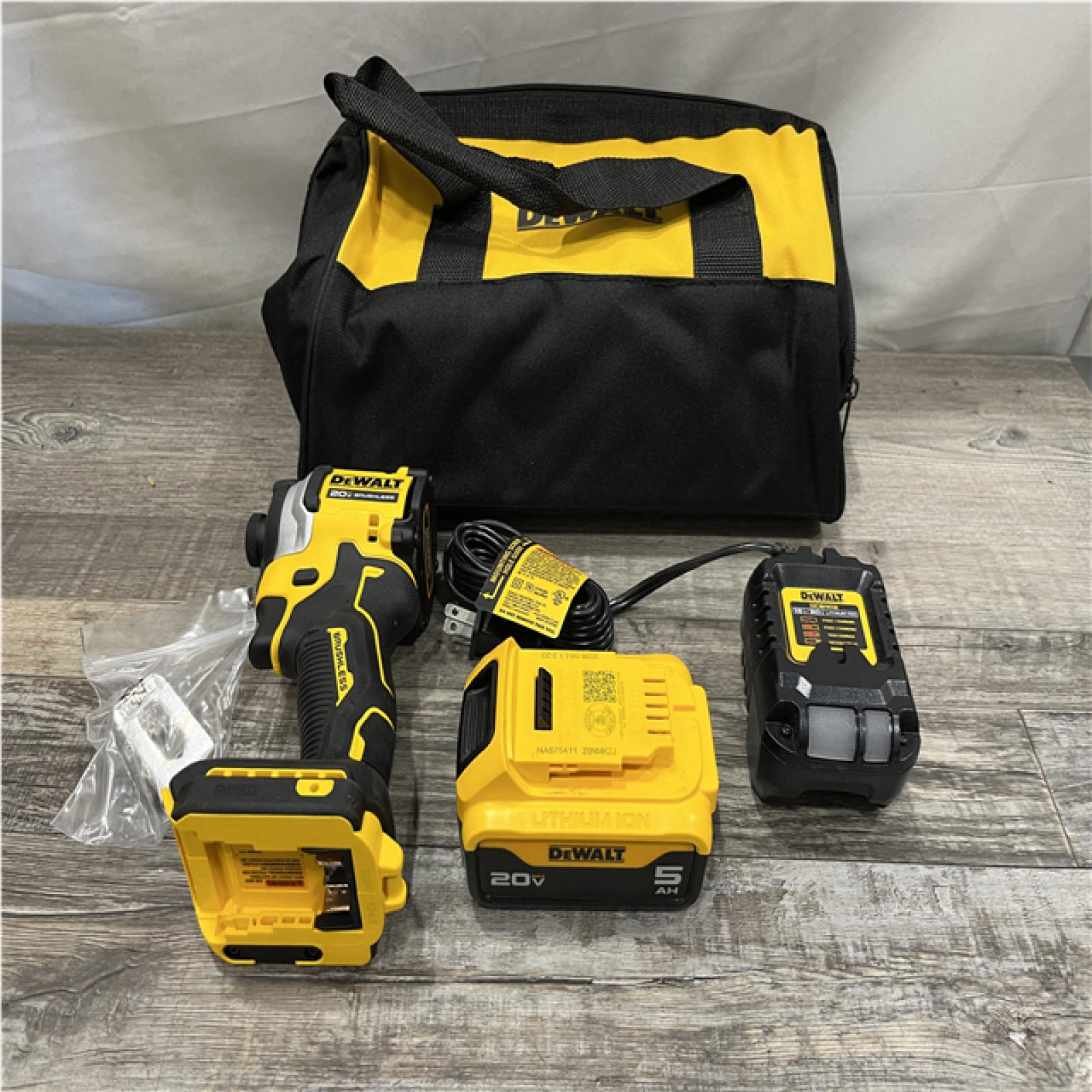 AS-IS DEWALT ATOMIC 20V MAX Lithium-Ion Cordless 1/4 in. Brushless Impact Driver Kit