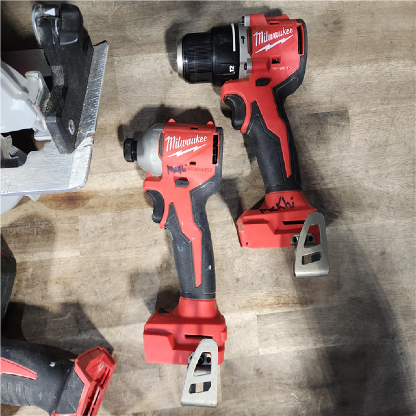 HOUSTON LOCATION - AS-IS Milwaukee M18 18-Volt Lithium-Ion Brushless Cordless Combo Kit (4-Tool) with 2-Batteries  1-Charger and Tool Bag