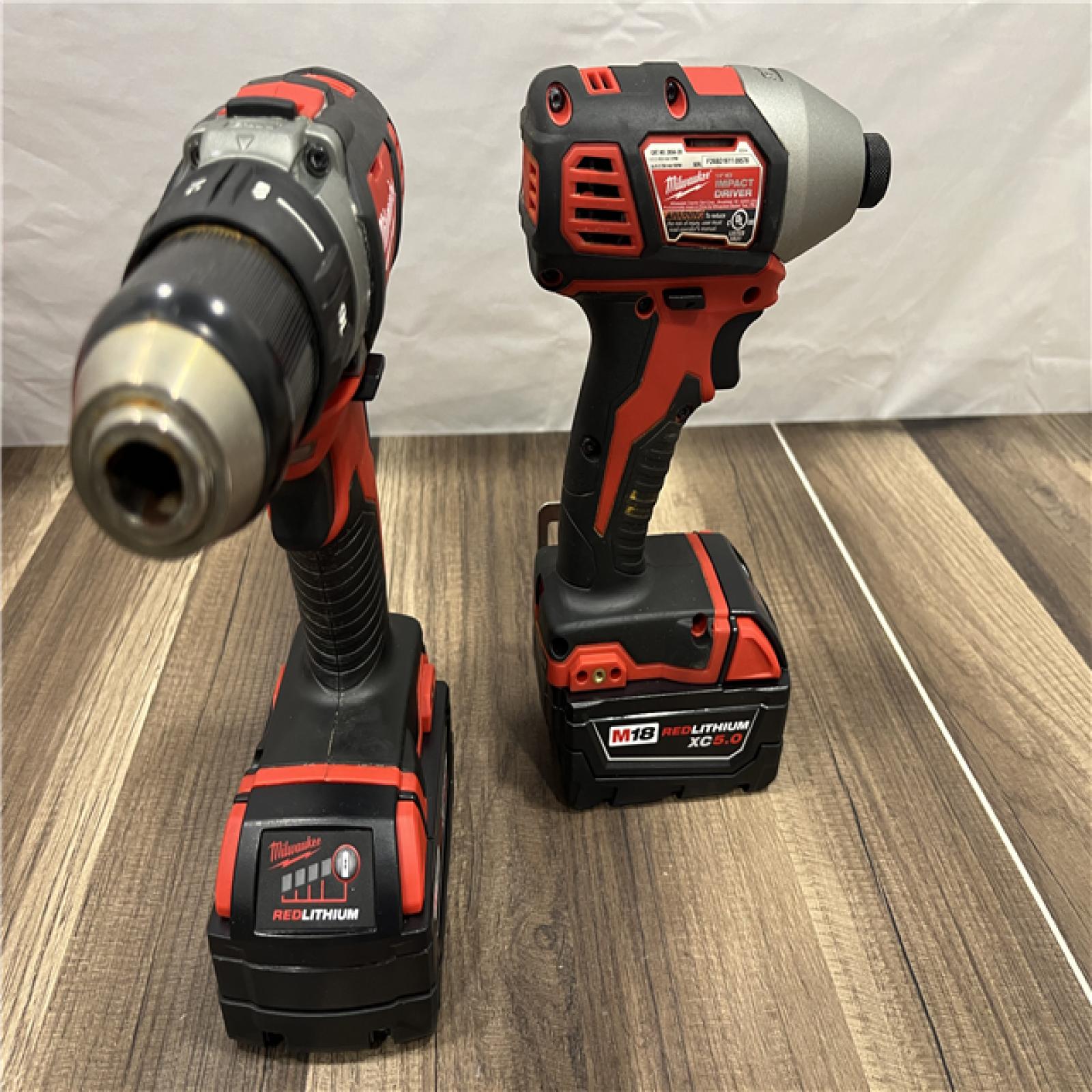 AS-IS Milwaukee M18 FUEL 18V Lithium-Ion Brushless Cordless Hammer Drill and Impact Driver Combo Kit (2-Tool) with 2 Batteries