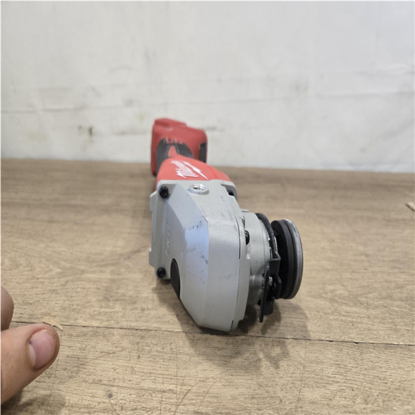 AS-IS Milwaukee 18V Lithium-Ion Brushless Cordless 4-1/2 in./5 in. Grinder w/Paddle Switch (Tool-Only)
