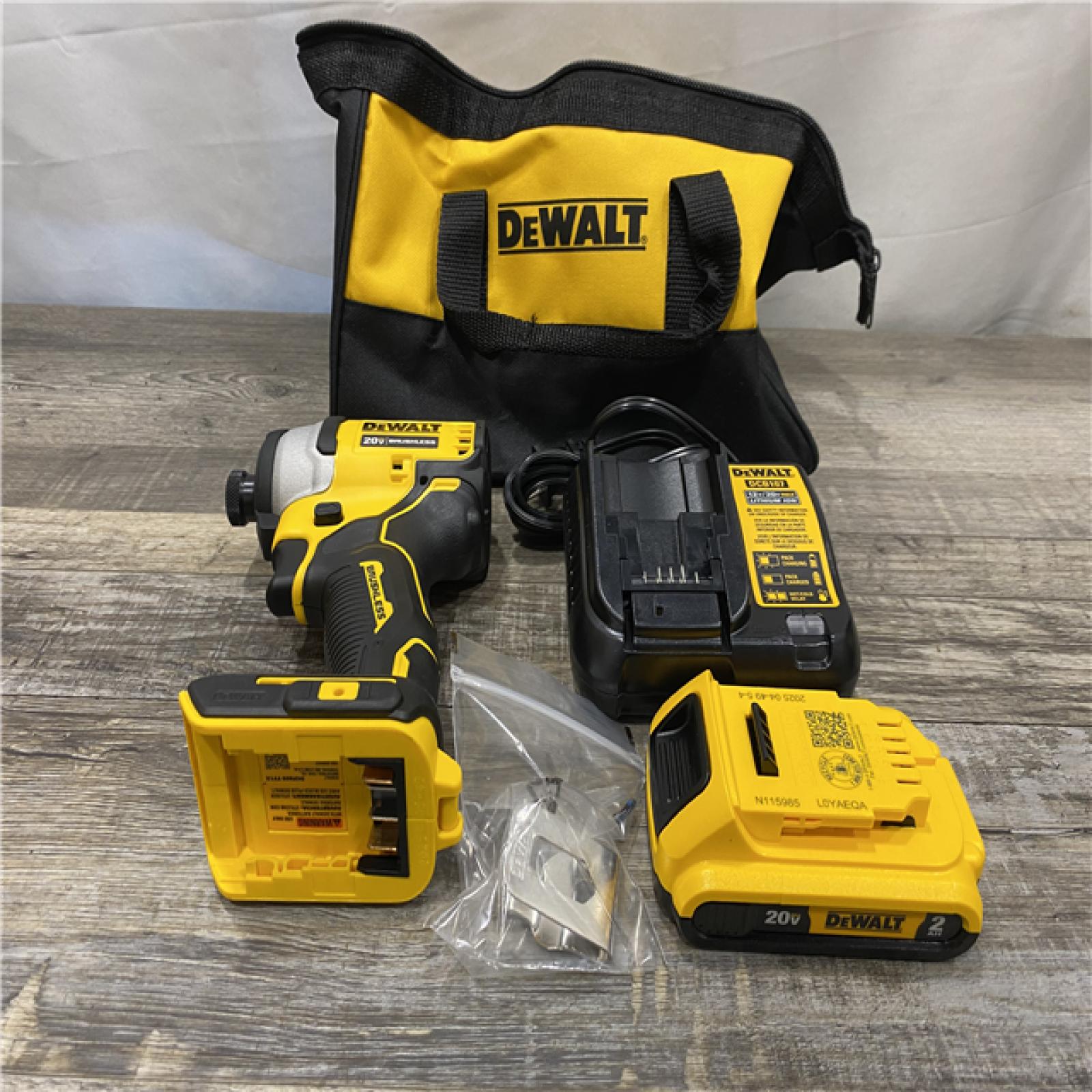 AS-IS DEWALT Atomic 20V Max Lithium-Ion Brushless Cordless Compact 1/4 in. Impact Driver Kit
