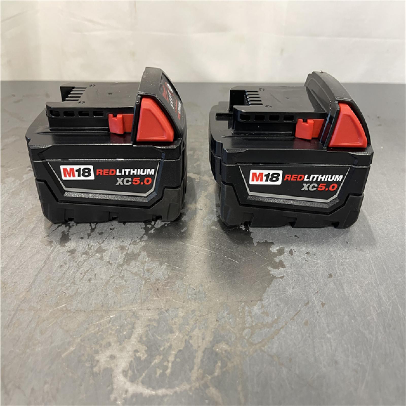 AS-IS - Milwaukee M18 18-Volt Lithium-Ion XC Starter Kit with Two 5.0Ah Batteries and Charger