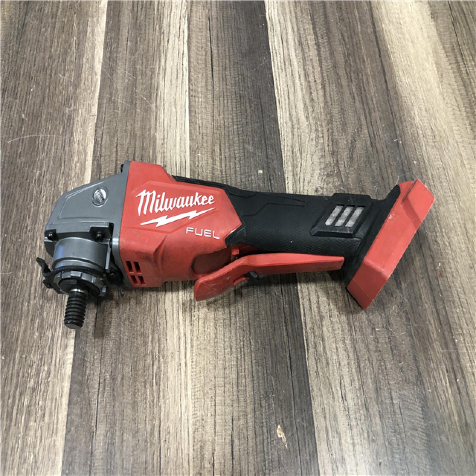 AS-IS Milwaukee FUEL 18V Lithium-Ion Brushless Cordless 4-1/2 in./5 in. Grinder with Variable Speed & Paddle Switch (Tool-Only)