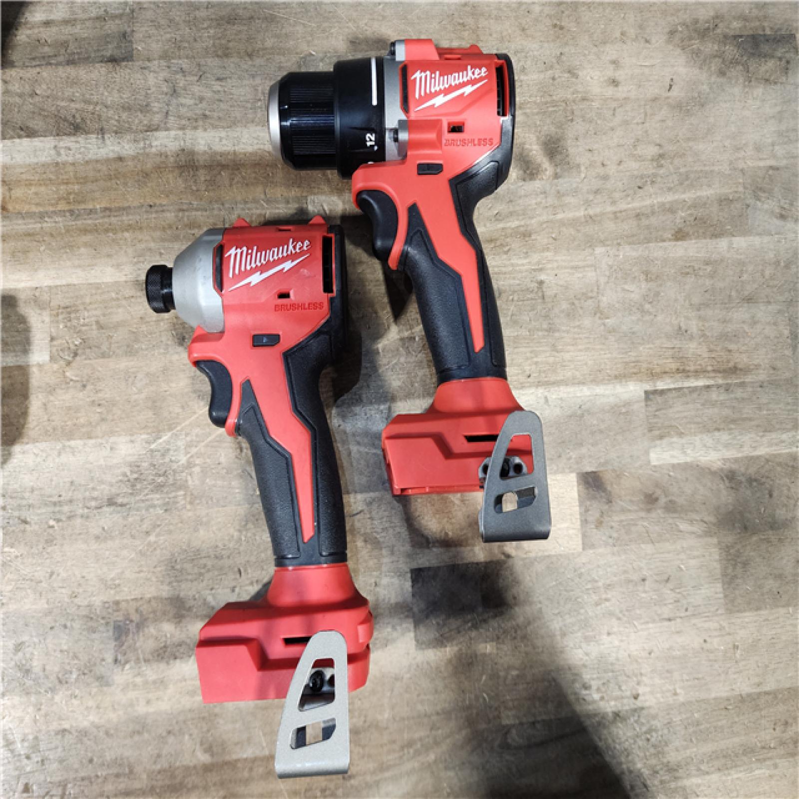 HOUSTON LOCATION - AS-IS Milwaukee M18 18V Lithium-Ion Brushless Cordless Compact Drill/Impact Combo Kit (2-Tool) W/(2) 2.0 Ah Batteries  Charger & Bag