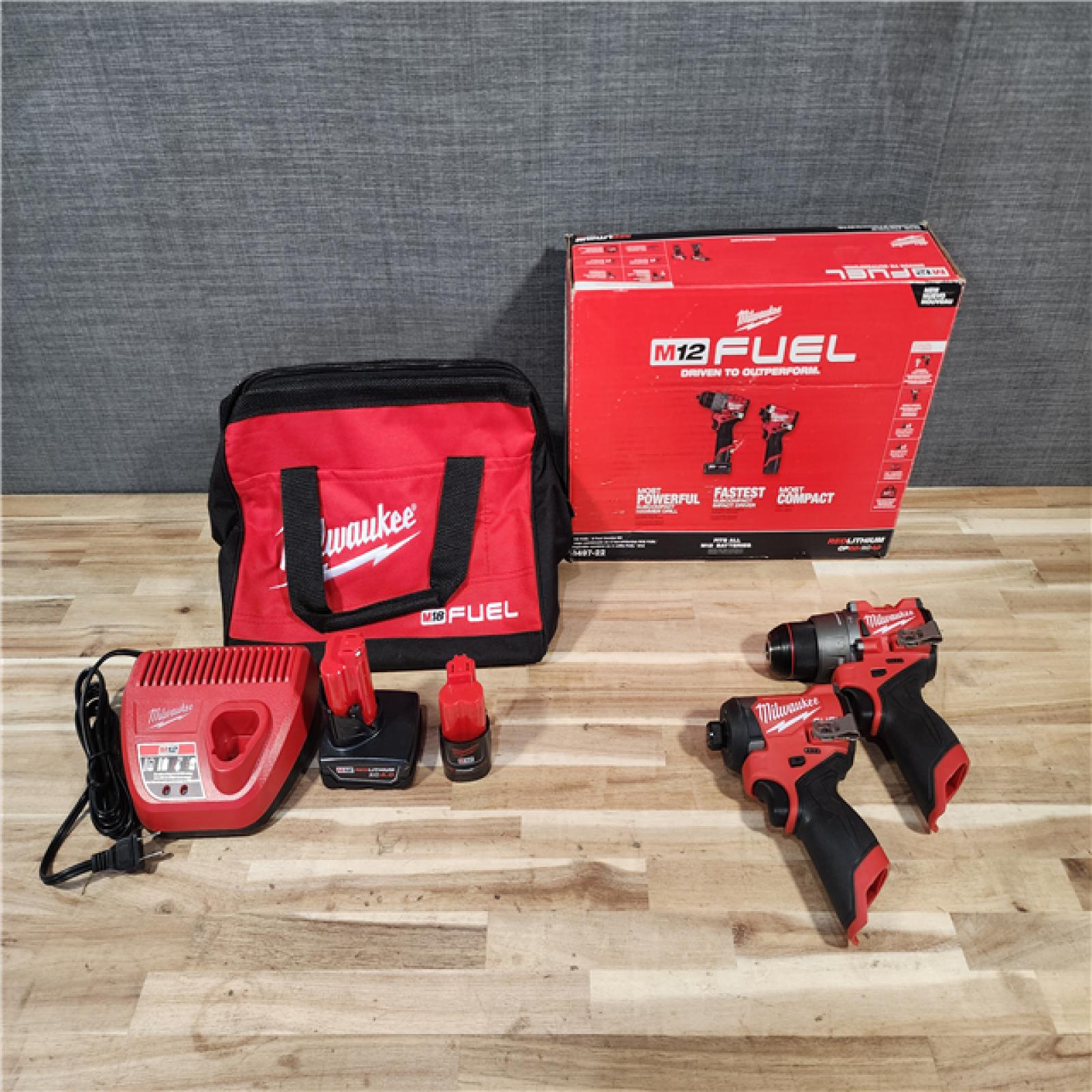 HOUSTON LOCATION - AS-IS Milwaukee FUEL 12-Volt Lithium-Ion Brushless Cordless Hammer Drill and Impact Driver Combo Kit
