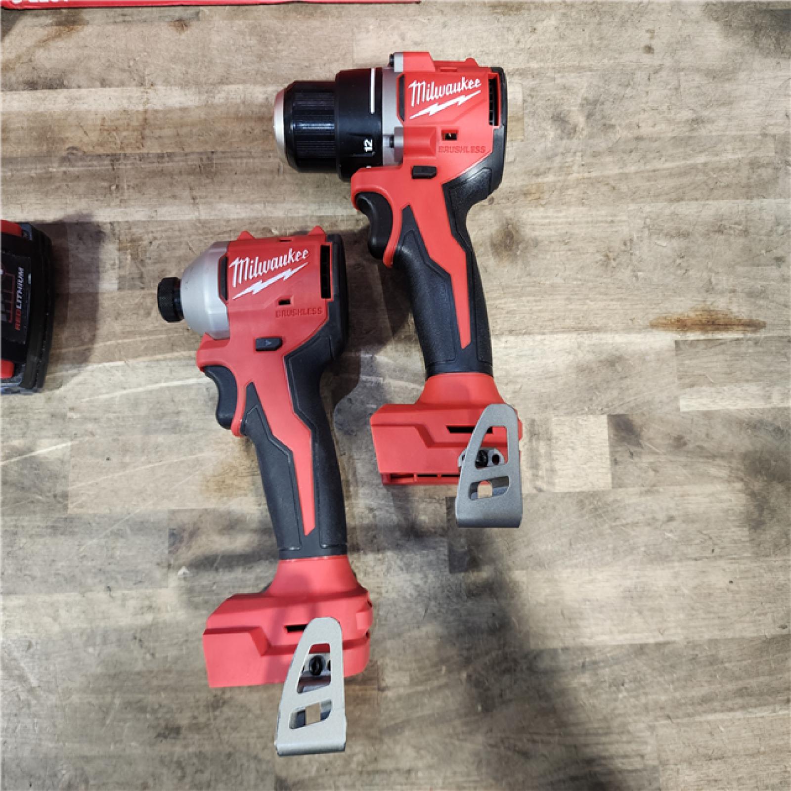 HOUSTON LOCATION - AS-IS Milwaukee M18 18V Lithium-Ion Brushless Cordless Compact Drill/Impact Combo Kit (2-Tool) W/(2) 2.0 Ah Batteries  Charger & Bag