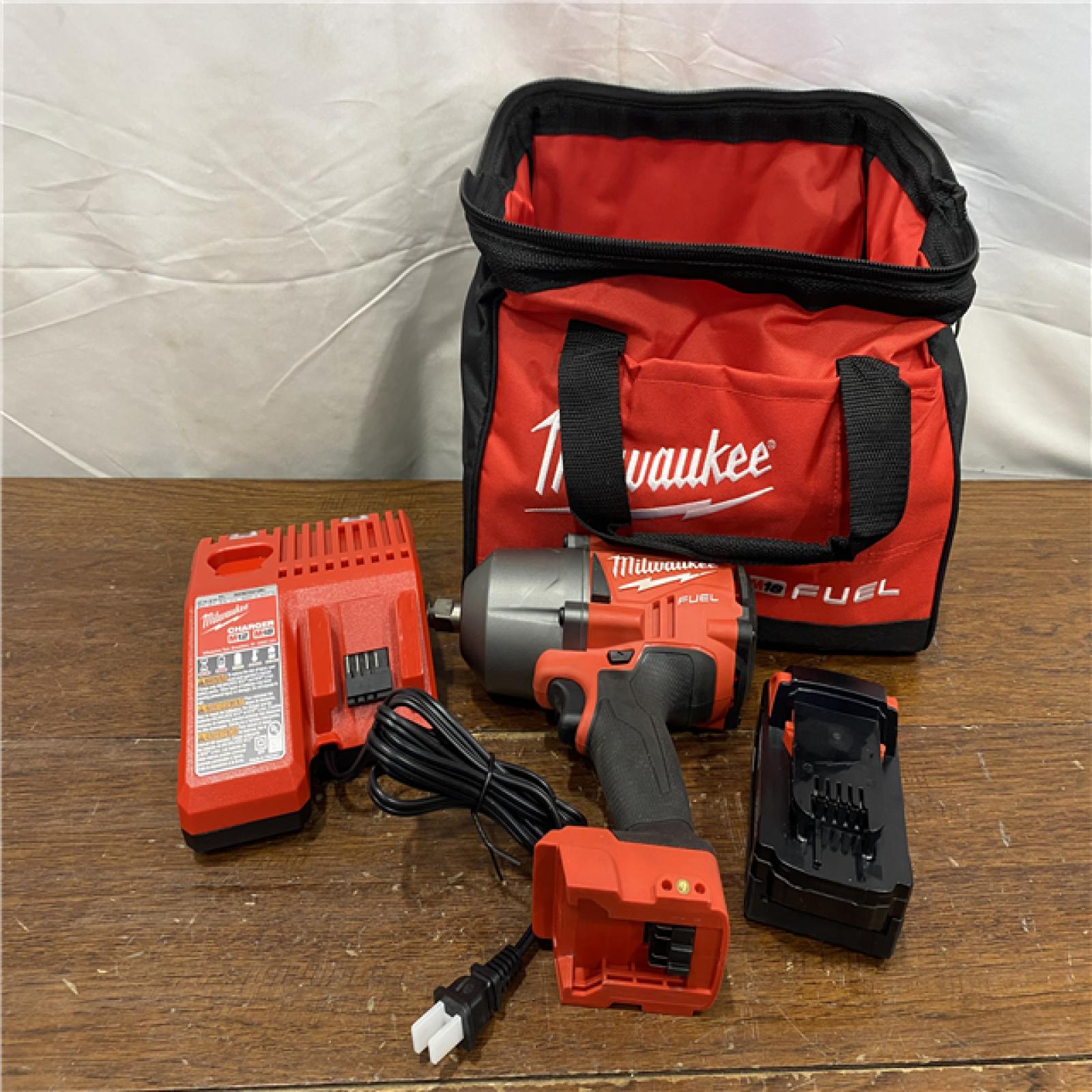 AS-IS Milwaukee M18 1/2 in. Cordless Brushless High Torque Impact Wrench Kit (Battery & Charger)