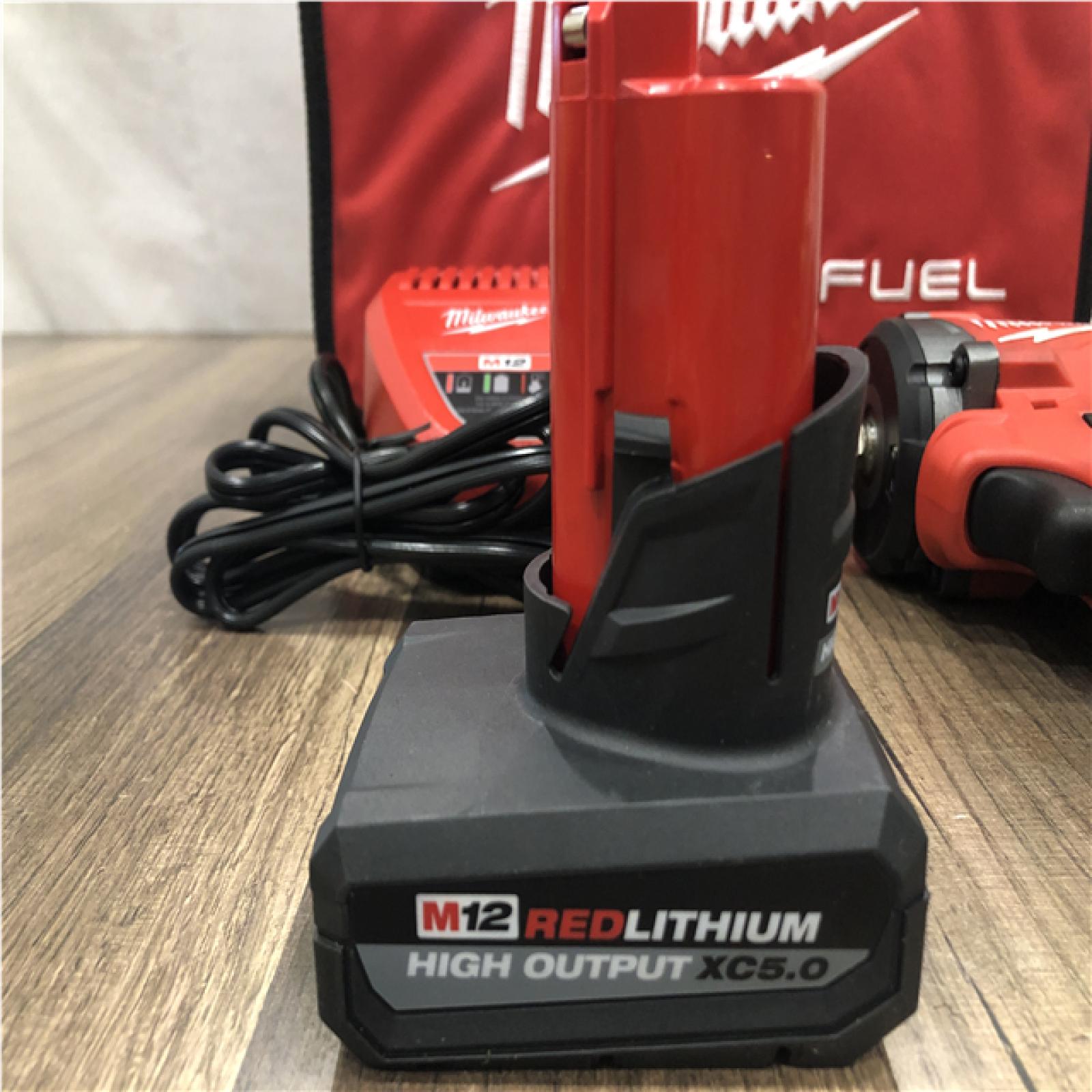 AS-IS Milwaukee FUEL 12V Li-Ion Brushless Cordless Stubby 3/8 in. Impact Wrench Kit