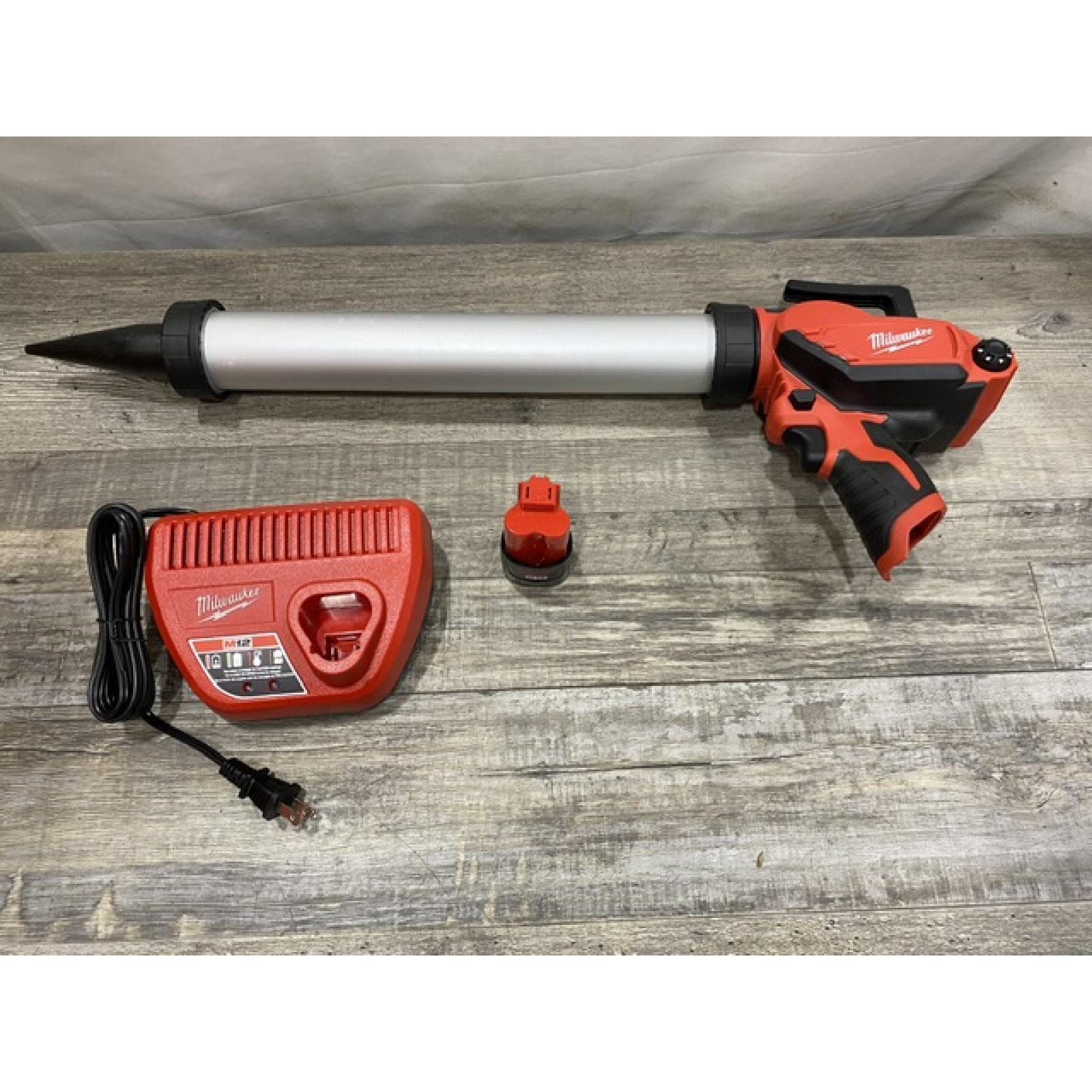 AS-IS Milwaukee 12V Lithium-ion Cordless 20 oz. Aluminum Barrel Adhesive and Caulk Gun Kit