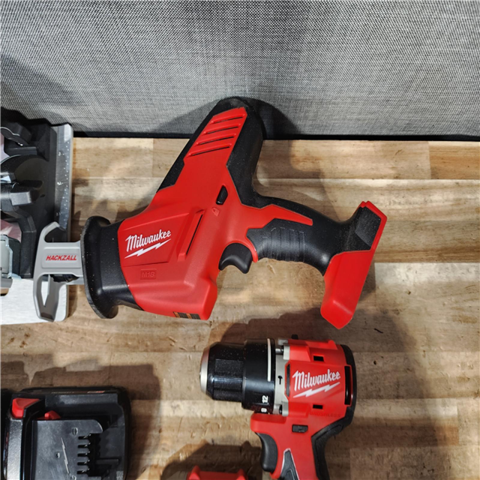 HOUSTON LOCATION - AS - IS Milwaukee 4 Tool Combo Kit W/ (2) Battery & Charger