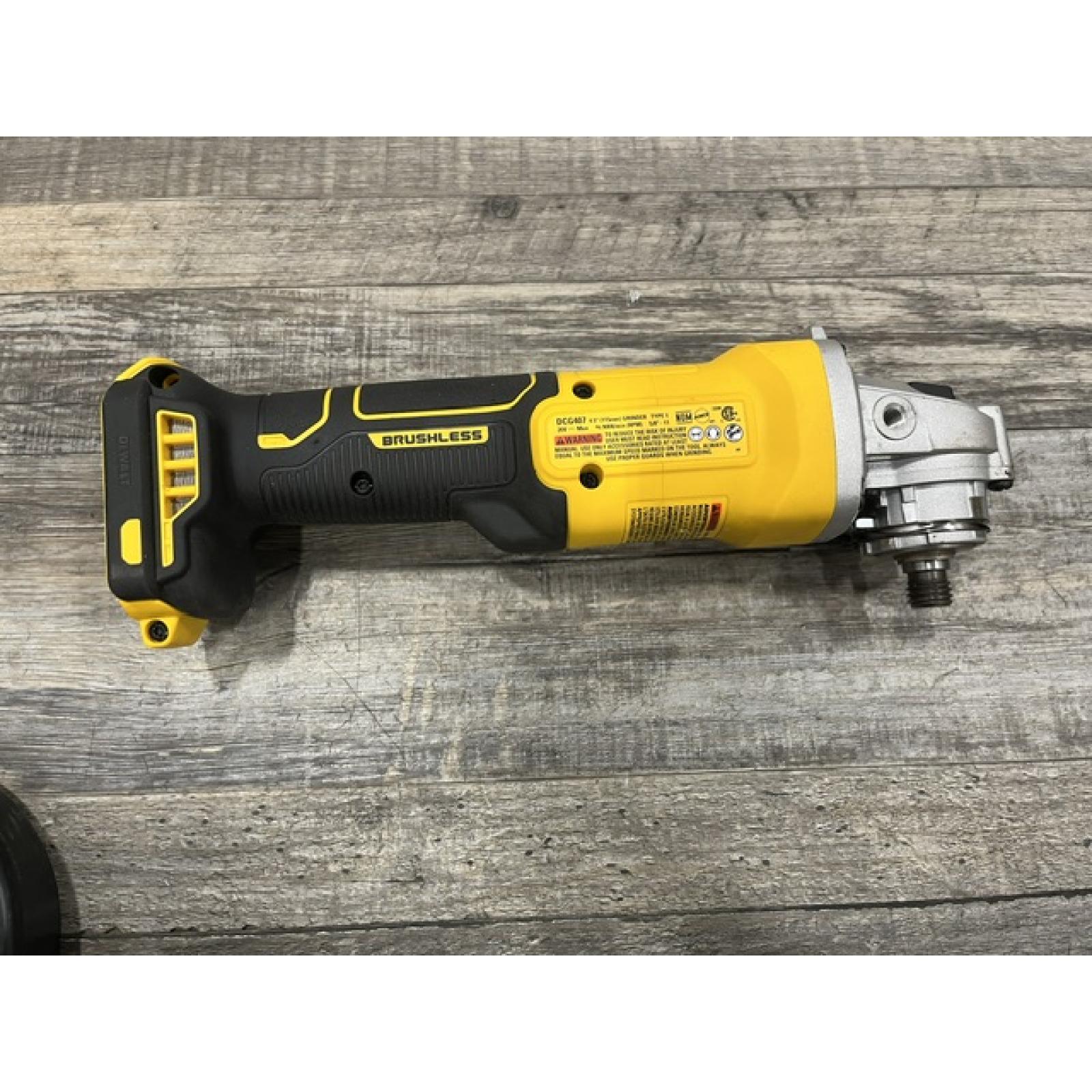 AS-IS DEWALT 20-Volt MAX Cordless Brushless 4-1/2 in. Angle Grinder with Slide Switch (Tool Only)