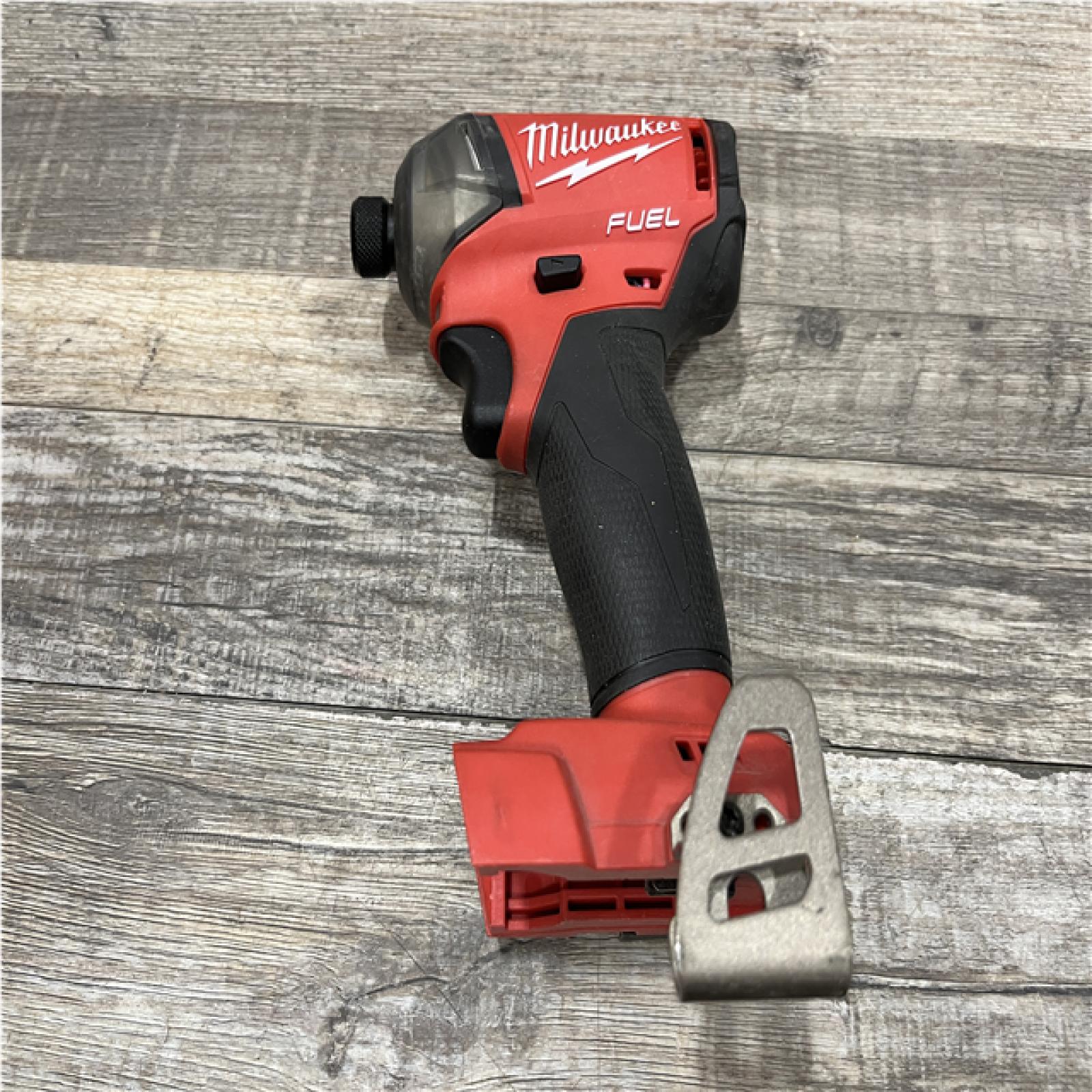 AS-IS Milwaukee FUEL SURGE 18-Volt Lithium-Ion Brushless Cordless 1/4 in. Hex Impact Driver Compact Kit