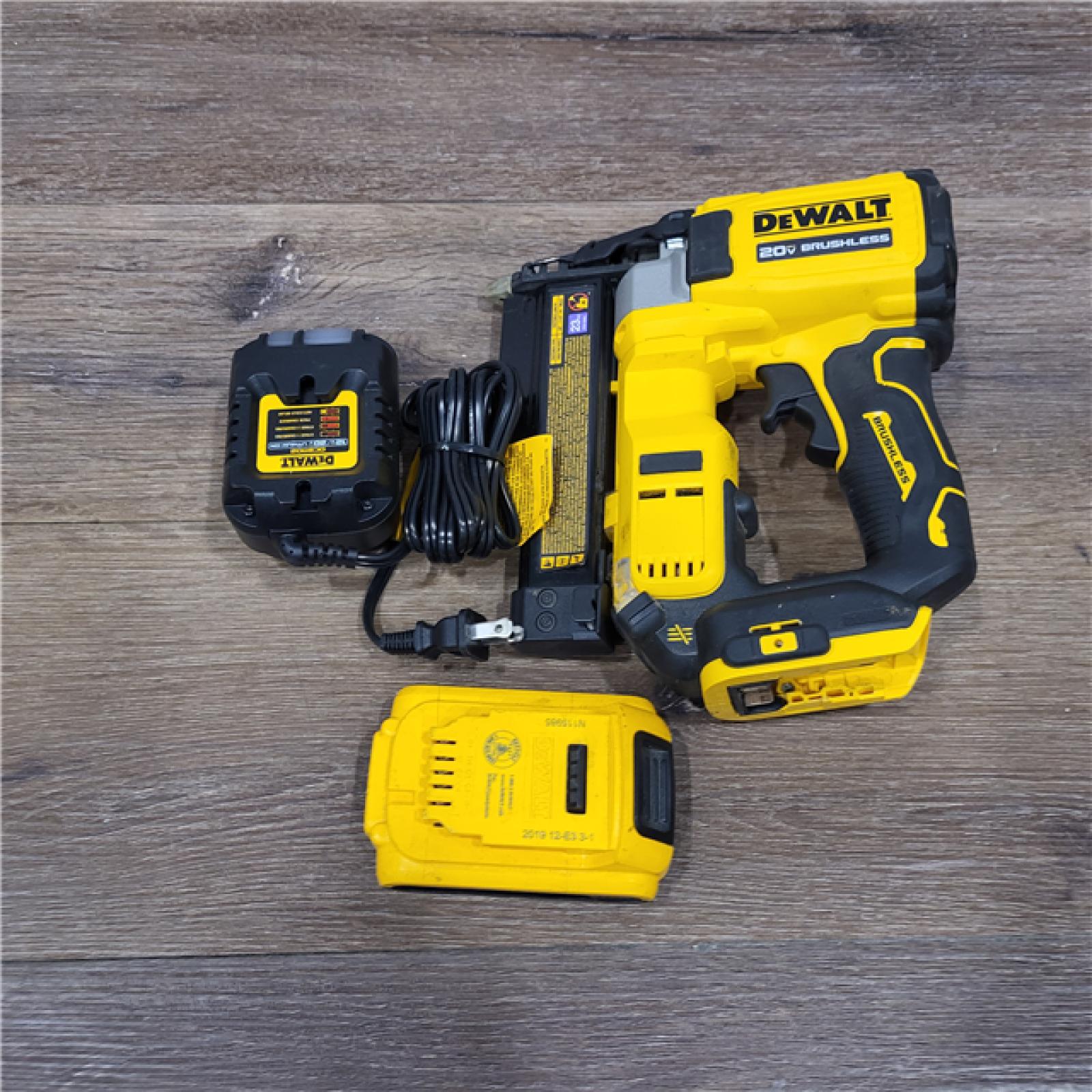 AS-IS DEWALT ATOMIC 20V MAX Lithium Ion Cordless 23 Gauge Pin Nailer Kit with 2.0Ah Battery and Charger