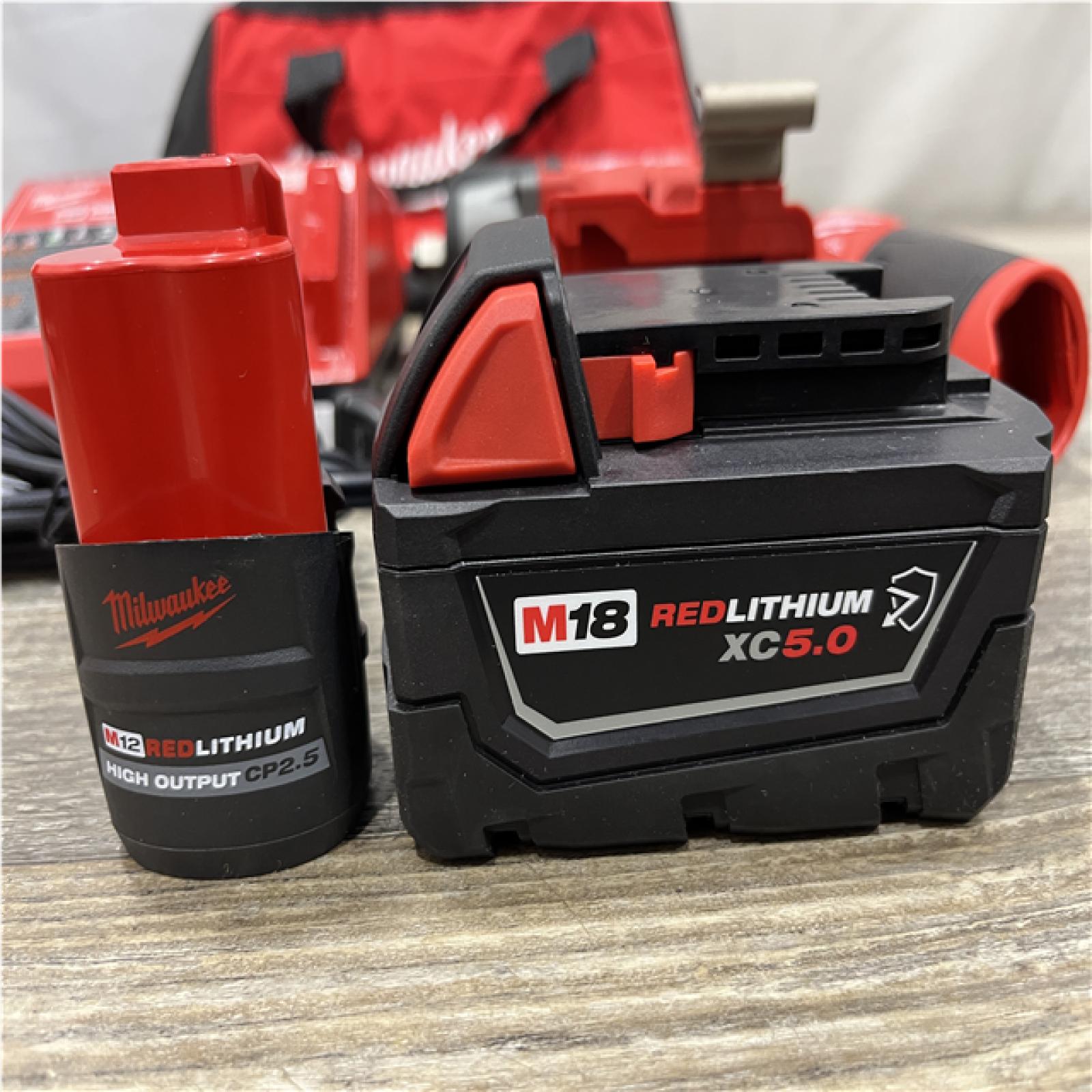 AS-IS Milwaukee FUEL 18V Cordless Mid Torque 1/2 in. Impact Wrench w/ 12 FUEL 3/8 in. Ratchet Combo Kit