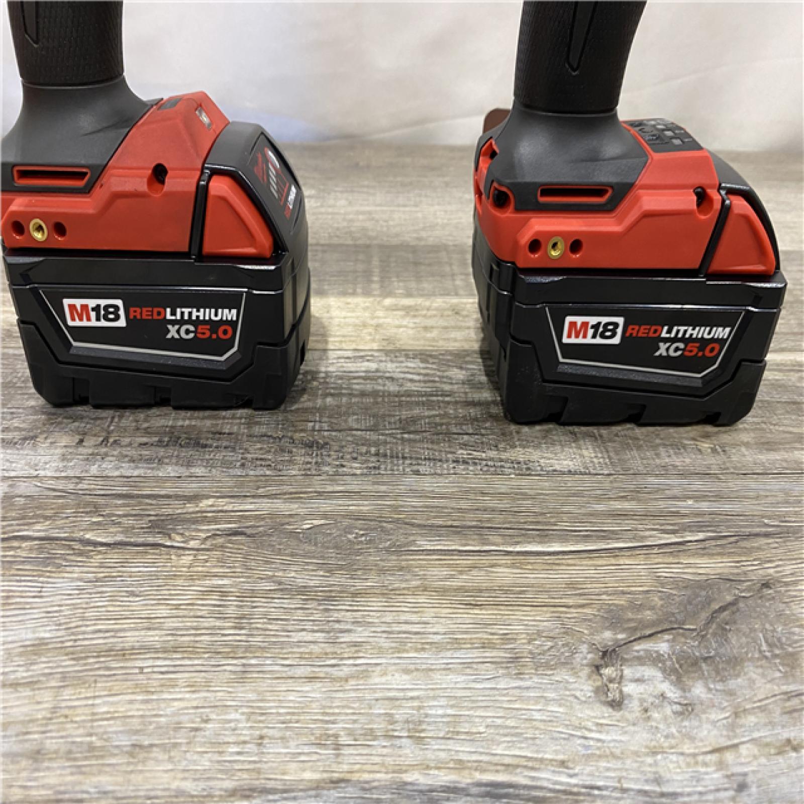 AS-IS Milwaukee FUEL 18V Lithium-Ion Brushless Cordless Hammer Drill and Impact Driver Combo Kit