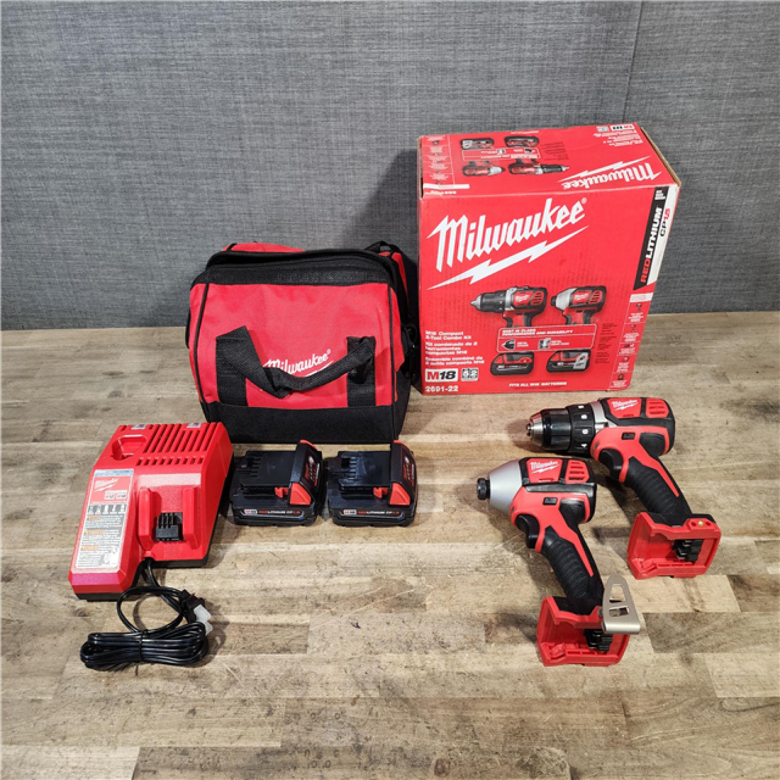 HOUSTON LOCATION - AS-IS Milwaukee 18V Lithium-Ion Cordless Drill Driver/Impact Driver Combo Kit