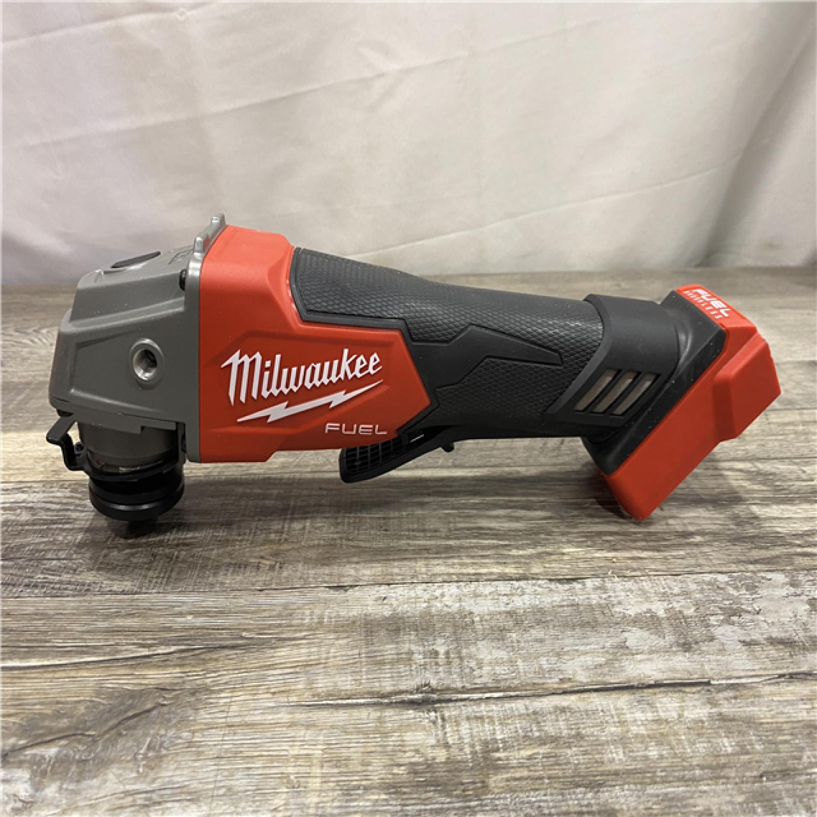 AS-IS Milwaukee FUEL 18V Lithium-Ion Brushless Cordless 4-1/2 in./5 in. Grinder w/Paddle Switch (Tool-Only)