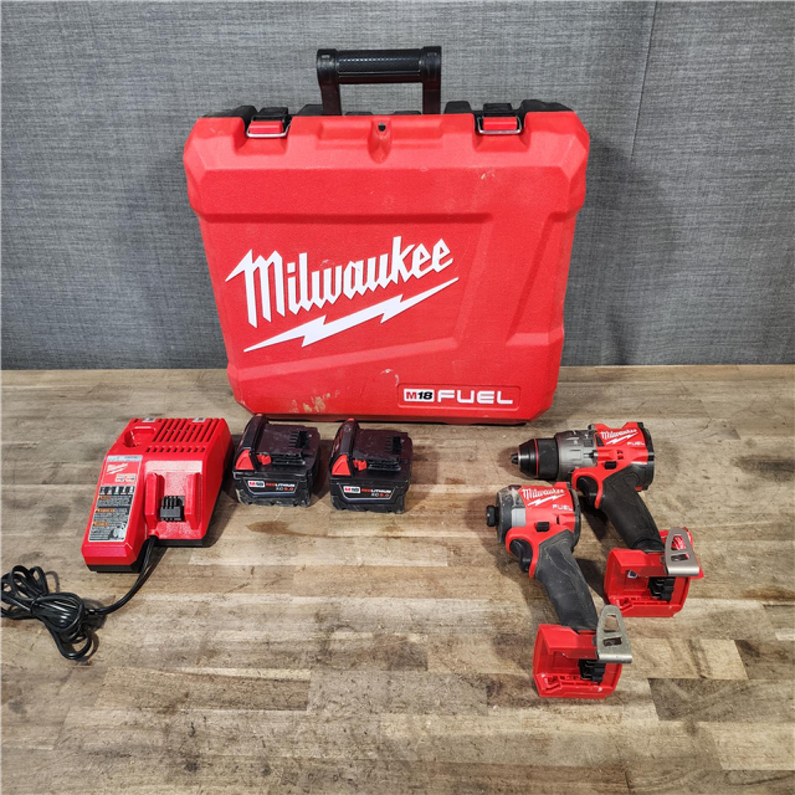 HOUSTON LOCATION - AS-IS MILWAUKEE FUEL 18V Lithium-Ion Brushless Cordless Hammer Drill and Impact Driver Combo Kit