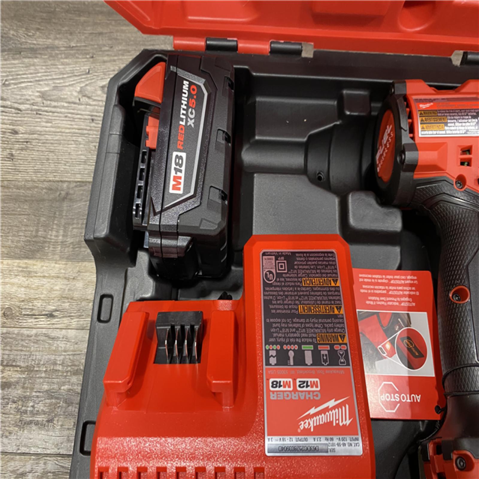 AS-IS Milwaukee FUEL 18V Lithium-Ion Brushless Cordless 1/2 in. Hammer Drill Driver Kit