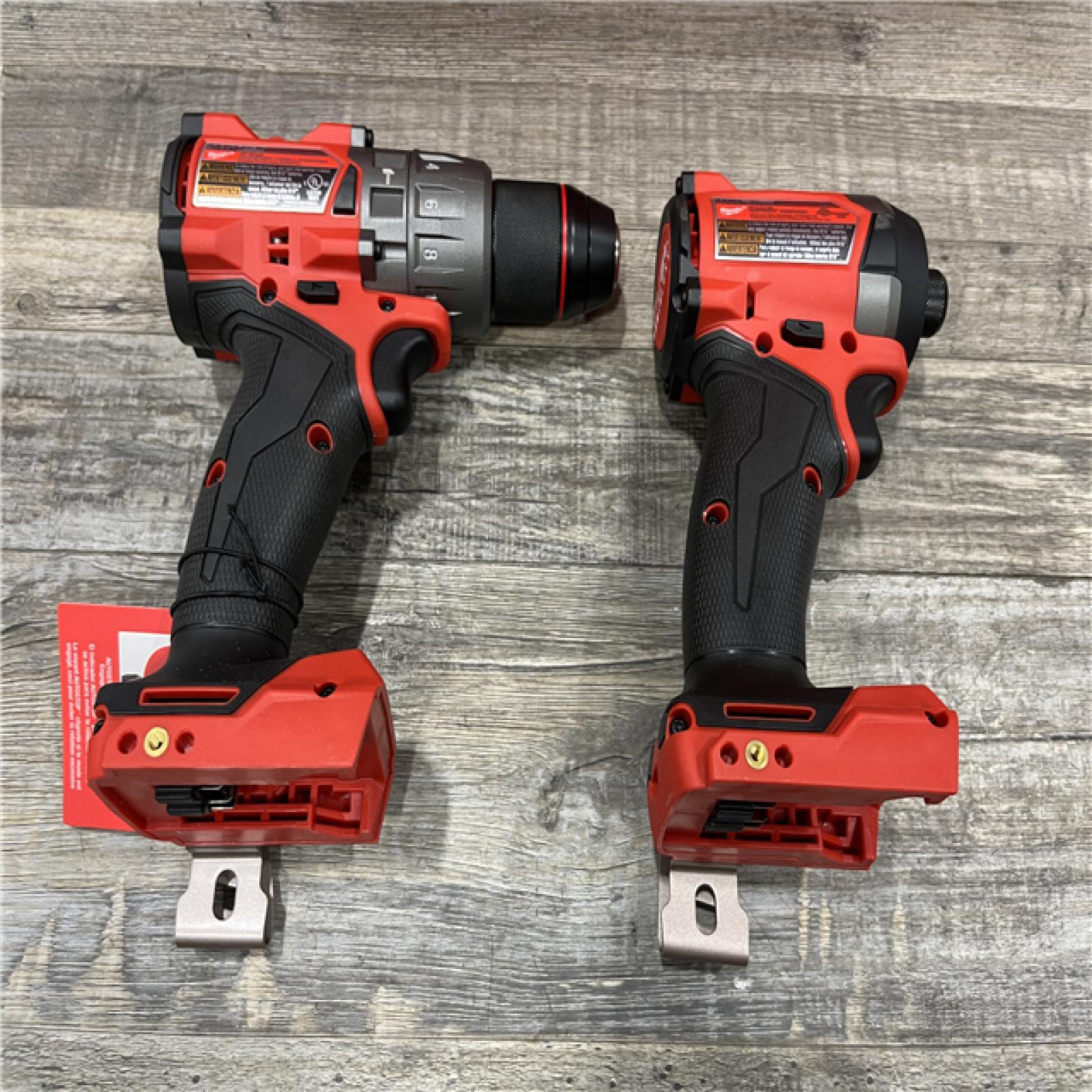 AS-IS Milwaukee FUEL 18V Lithium-Ion Brushless Cordless Hammer Drill and Impact Driver Combo Kit