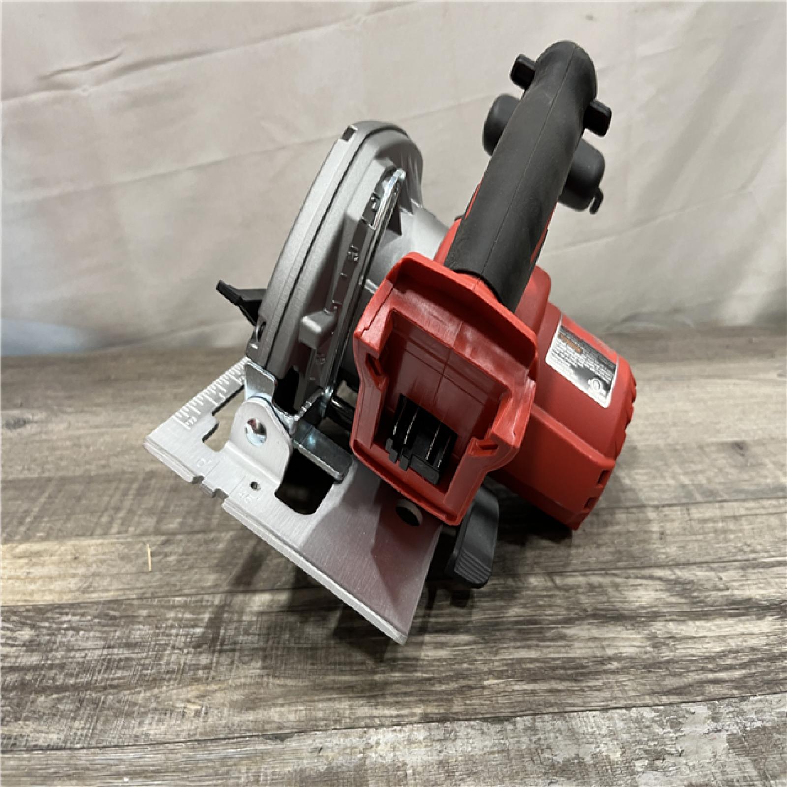 AS-IS Milwaukee 18V Lithium-Ion Cordless 6-1/2 in. Circular Saw (Tool-Only)
