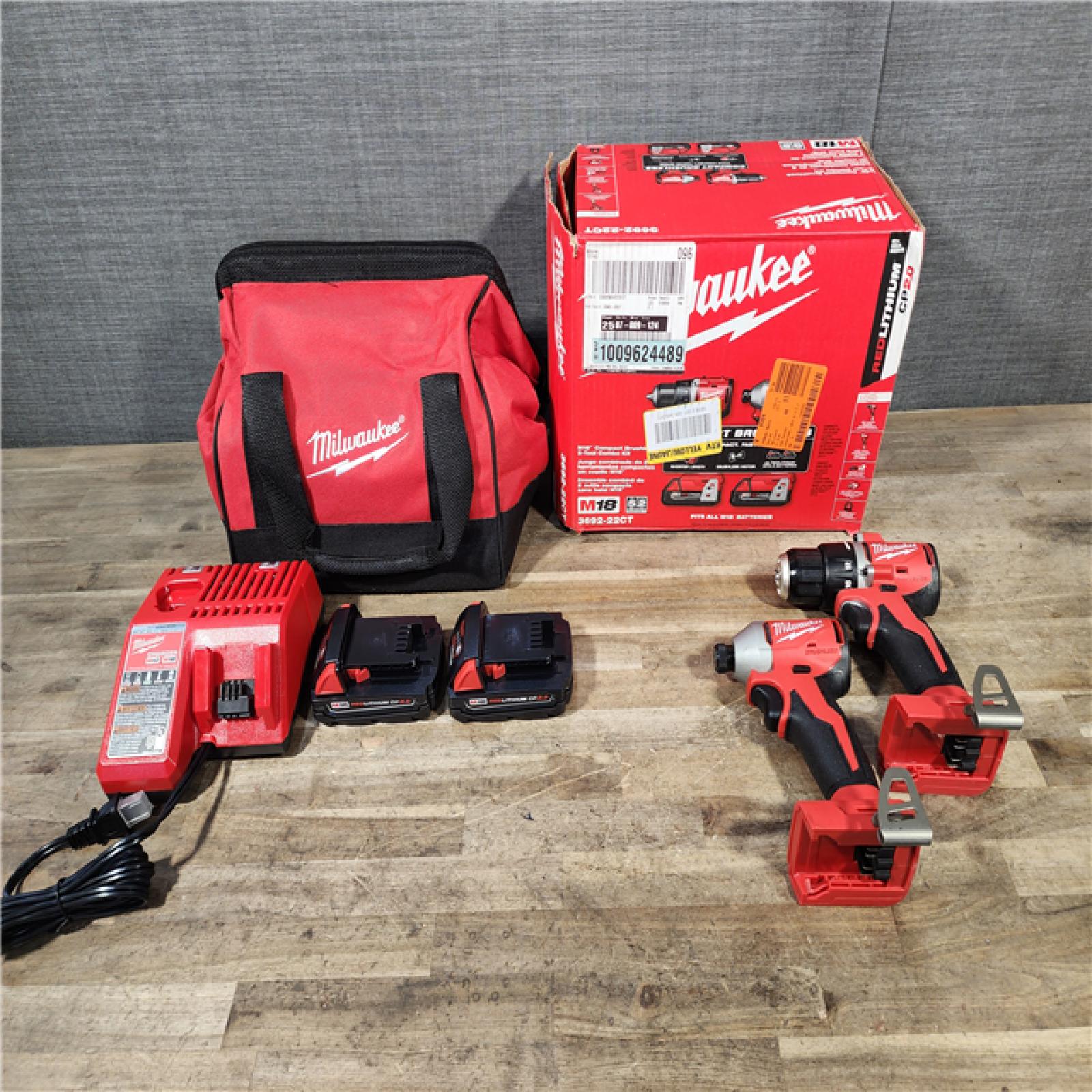 HOUSTON LOCATION - AS-IS Milwaukee M18 18V Lithium-Ion Brushless Cordless Compact Drill/Impact Combo Kit (2-Tool) W/(2) 2.0 Ah Batteries  Charger & Bag