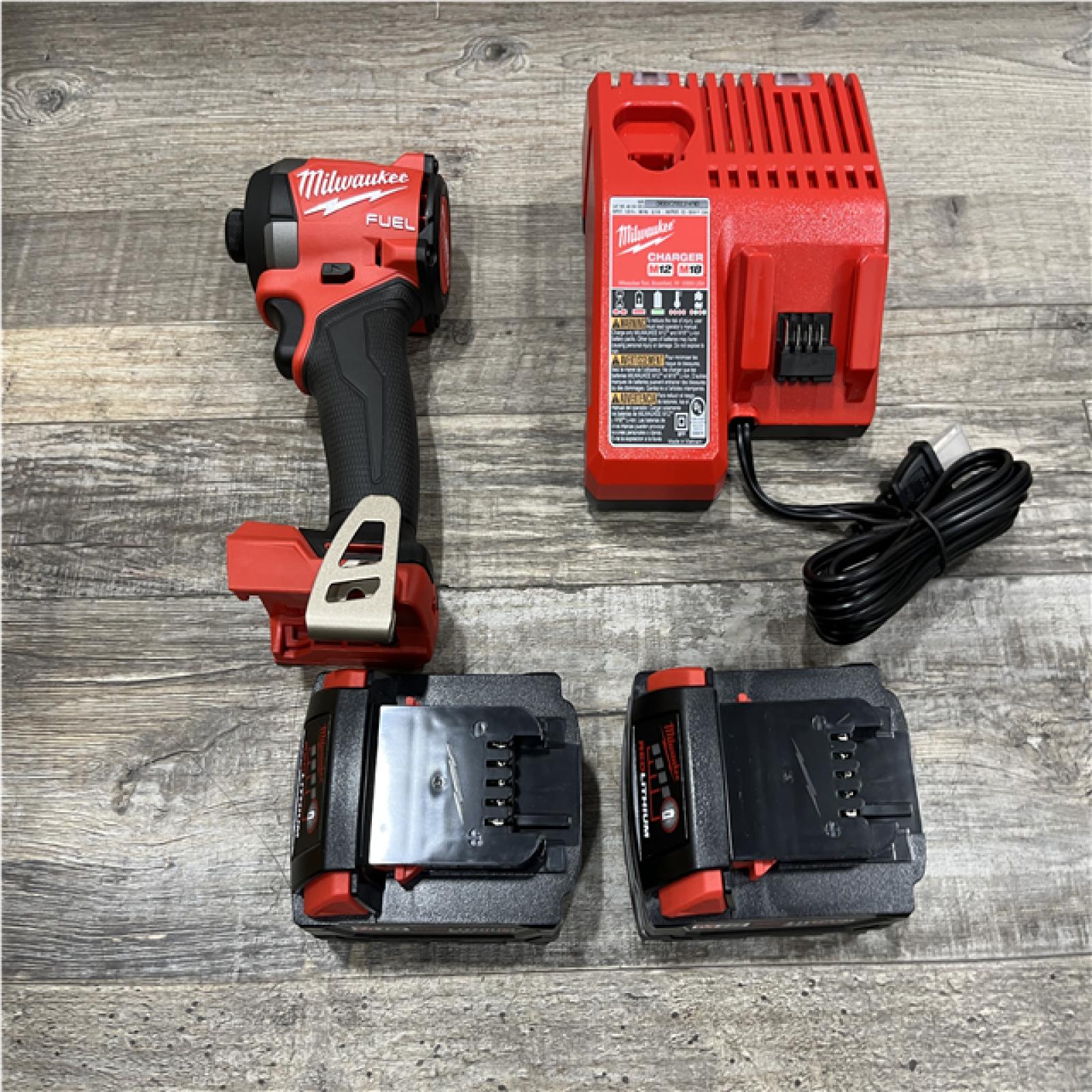 AS-IS Milwaukee FUEL 18V Lithium-Ion Brushless Cordless 1/4 in. Hex Impact Driver Kit