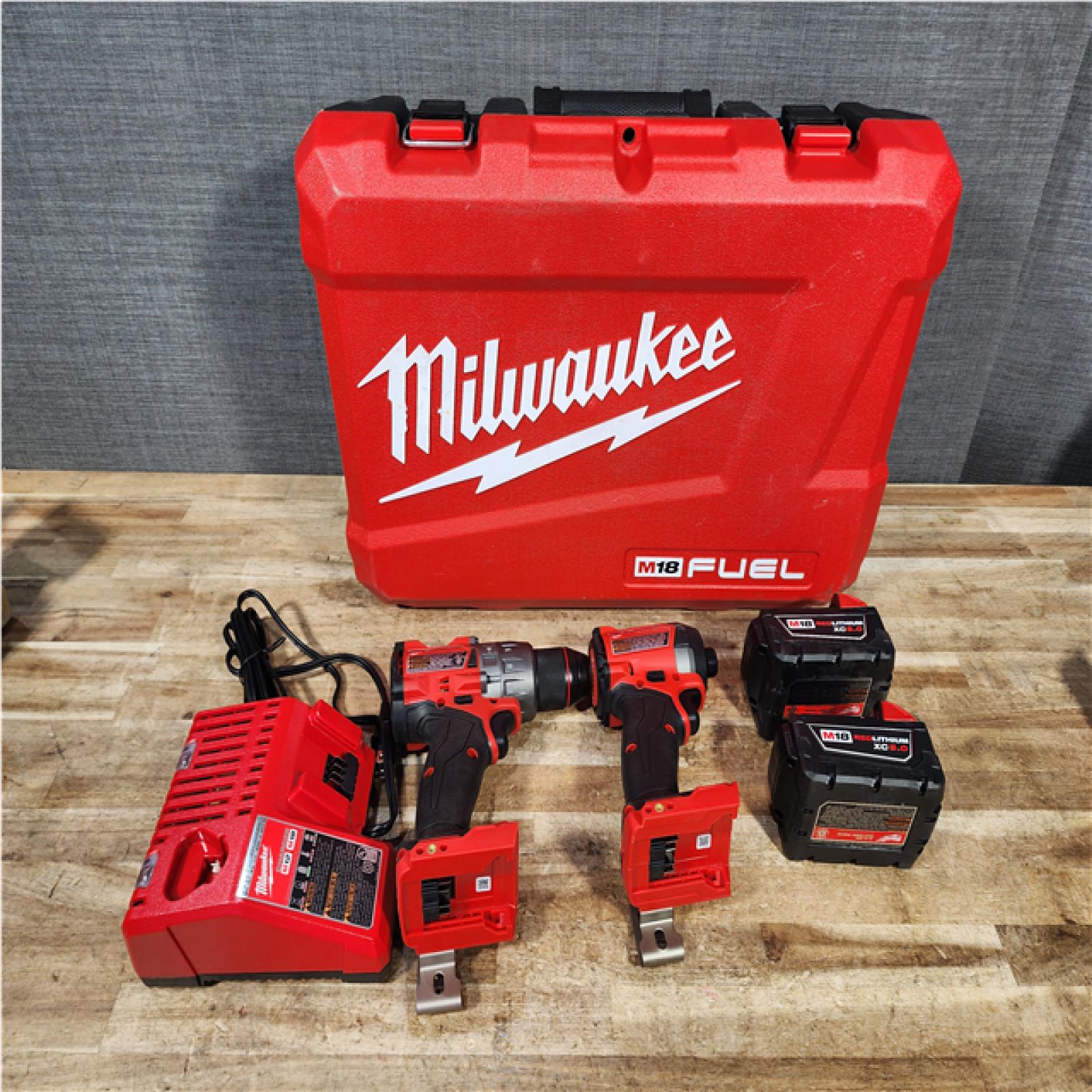 Houston Location AS-IS Milwaukee FUEL 18V Lithium-Ion Brushless Cordless Hammer Drill and Impact Driver Combo Kit