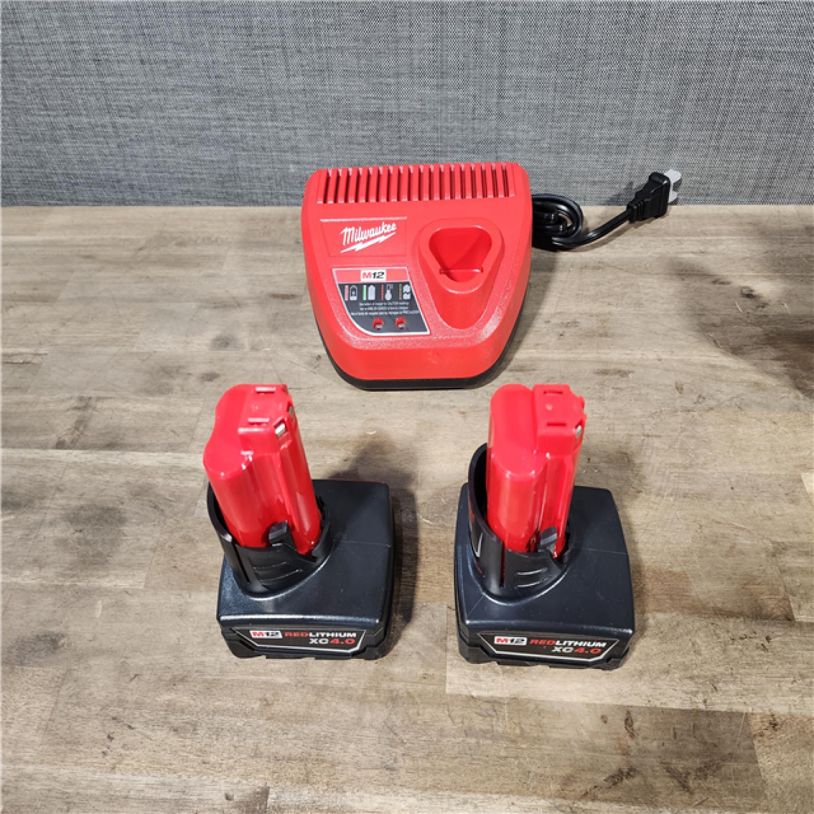 HOUSTON LOCATION - AS-IS MILWAUKEE 2 TOOL COMBO KIT W/ (2) BATTERY & CHARGER