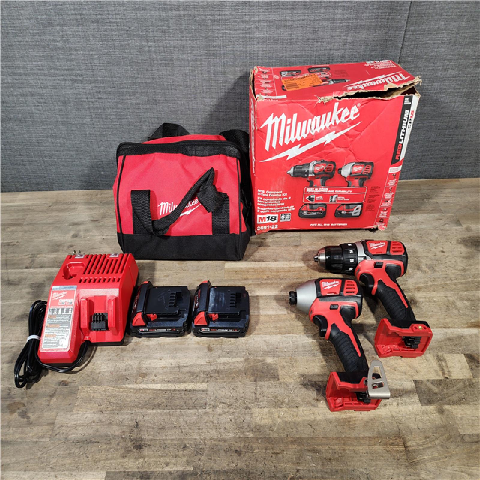 HOUSTON LOCATION - AS-IS Milwaukee 18V Cordless Brushed 2-Tool Drill/Driver and Impact Driver Kit