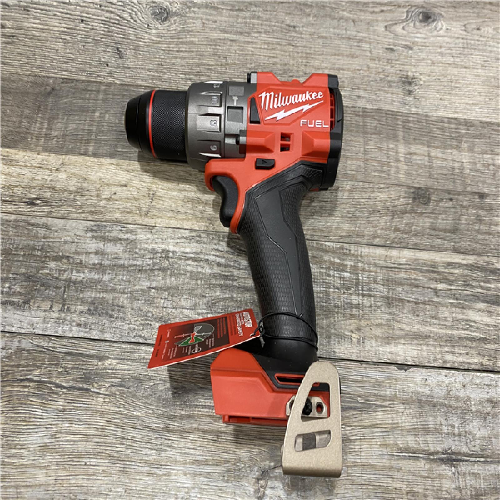 AS-IS Milwaukee FUEL 18V Lithium-Ion Brushless Cordless 1/2 in. Hammer Drill Driver Kit